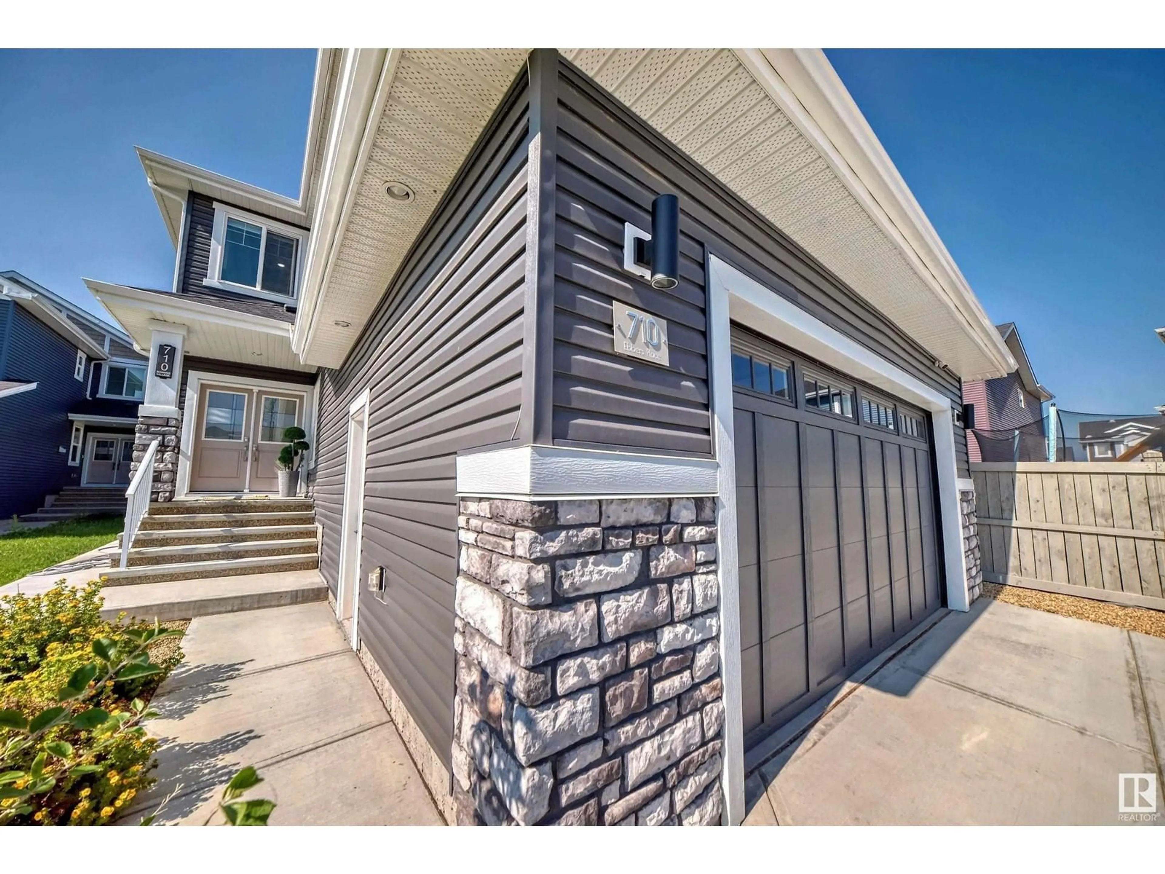 Home with vinyl exterior material, street for 710 EBBERS PL, Edmonton Alberta T5Y3V3