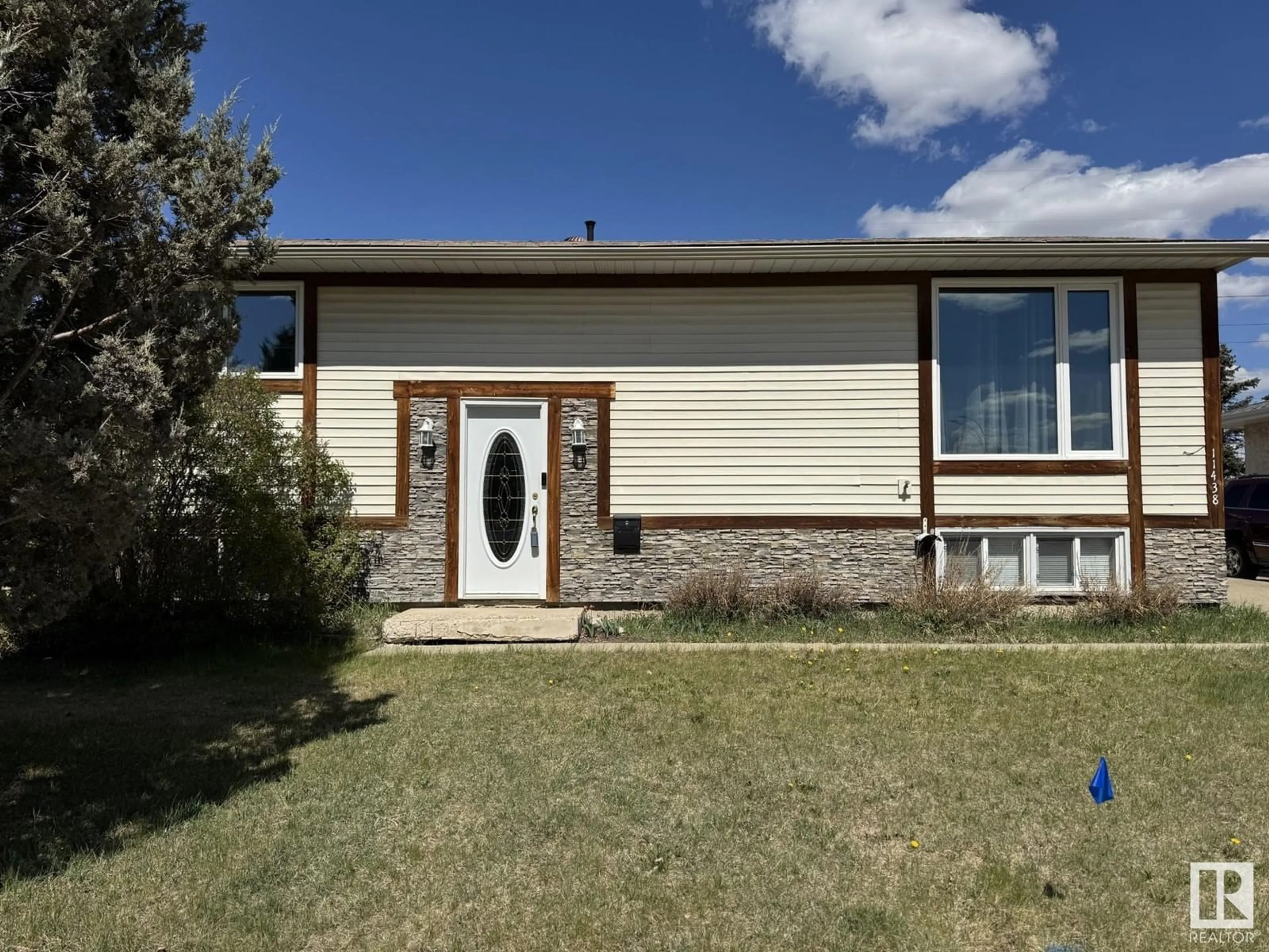 Home with vinyl exterior material, street for 11438 162A AV, Edmonton Alberta T5X2L7