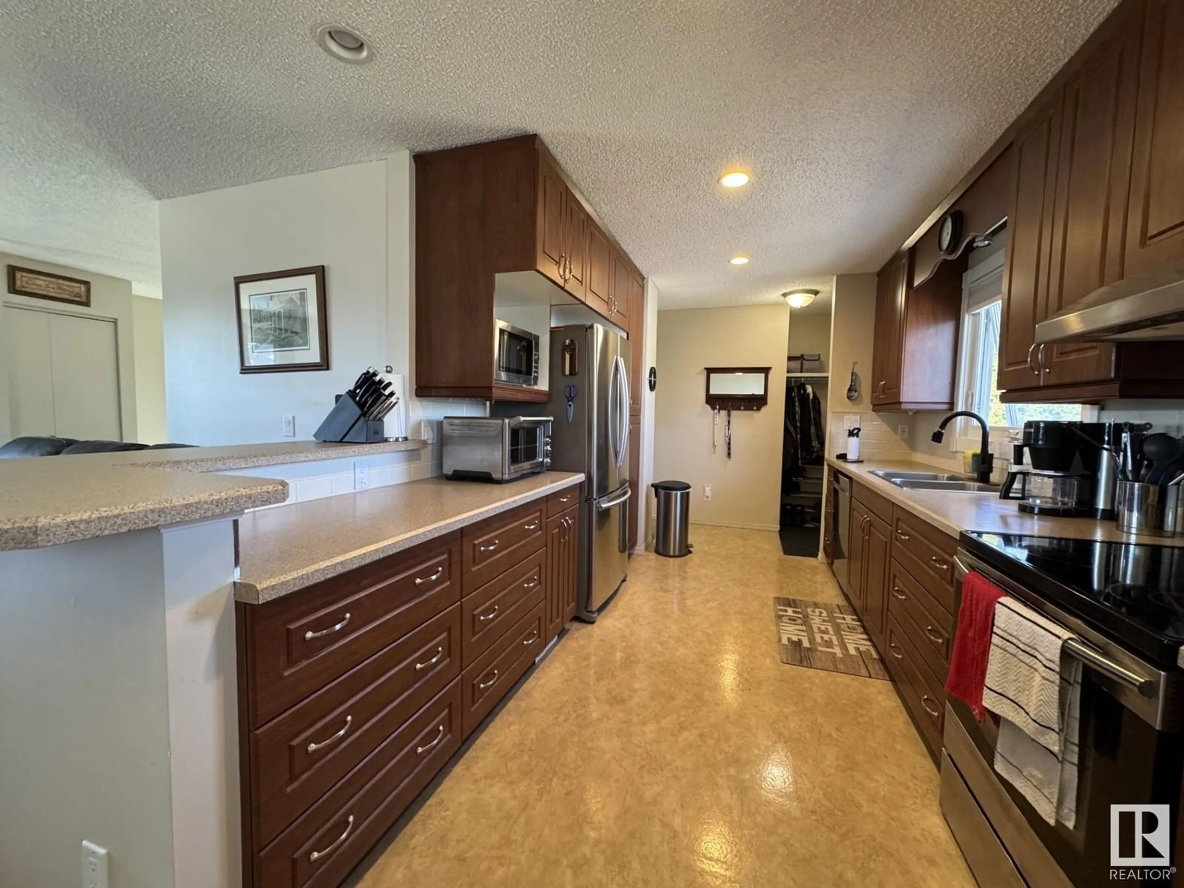 Open concept kitchen, ceramic/tile floor for 11438 162A AV, Edmonton Alberta T5X2L7