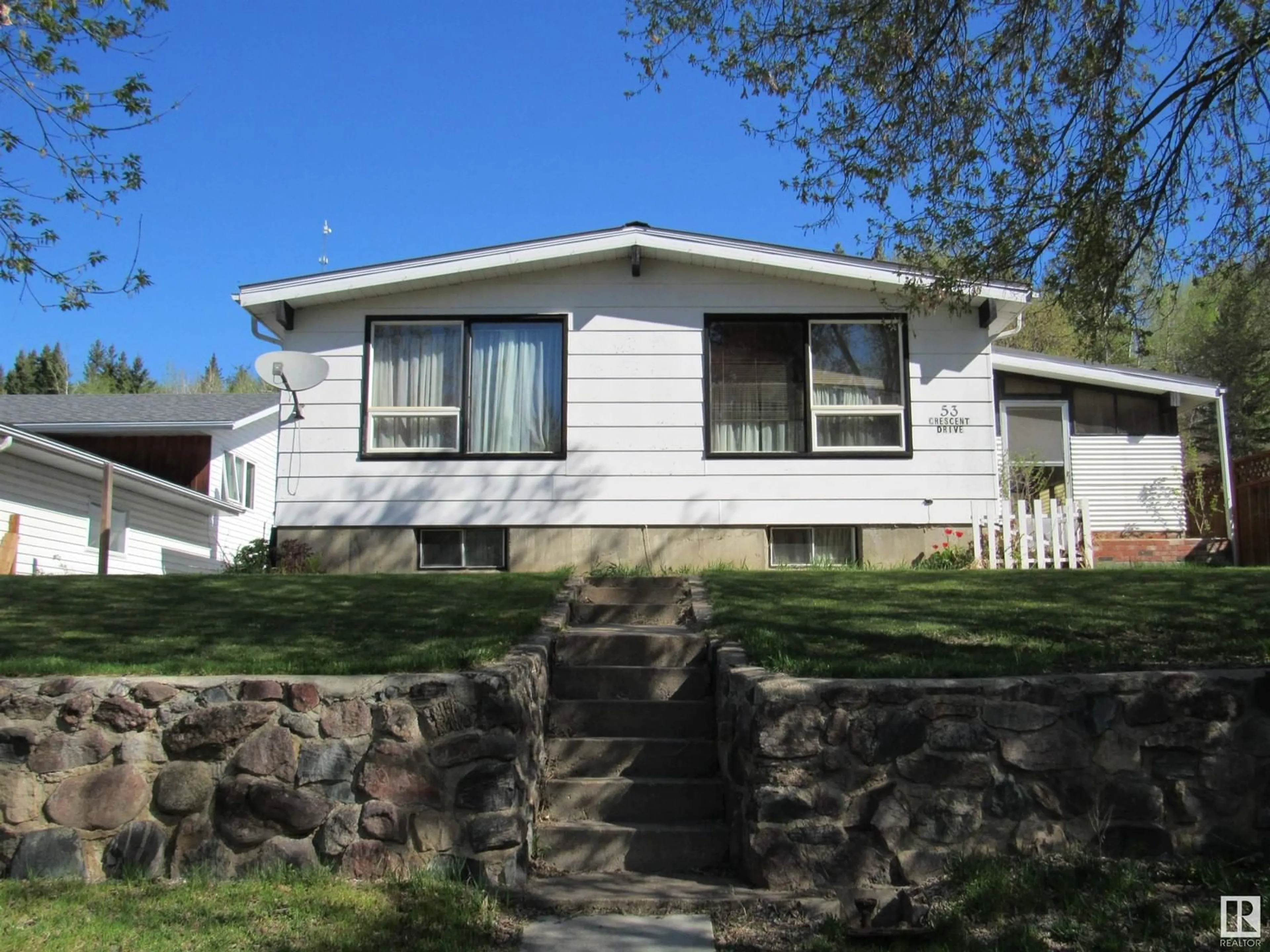 Home with vinyl exterior material, street for 53 CRESCENT DRIVE, Fort Assiniboine Alberta T0G1A0