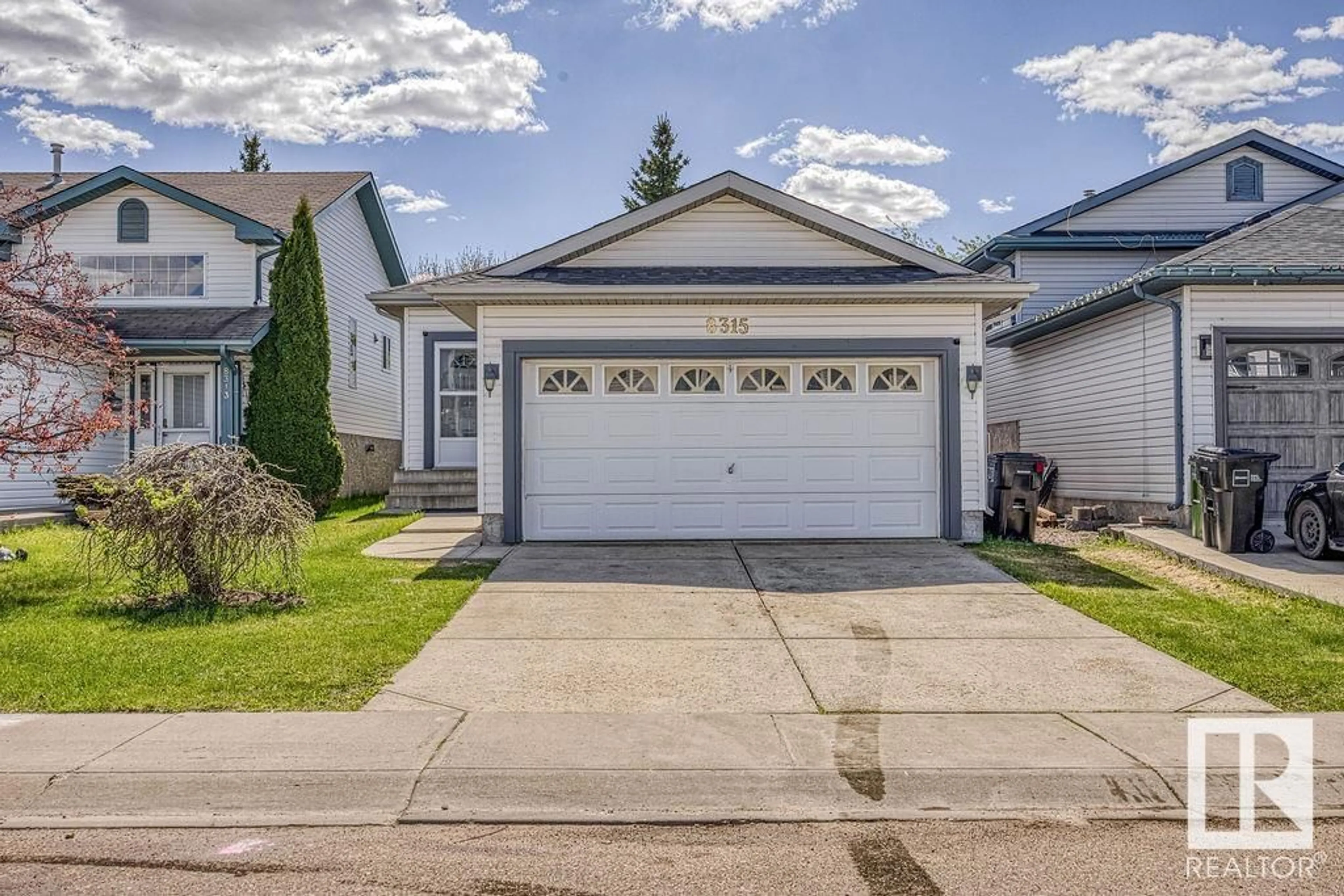 Home with vinyl exterior material, street for 8315 170 AV, Edmonton Alberta T5Z3G8