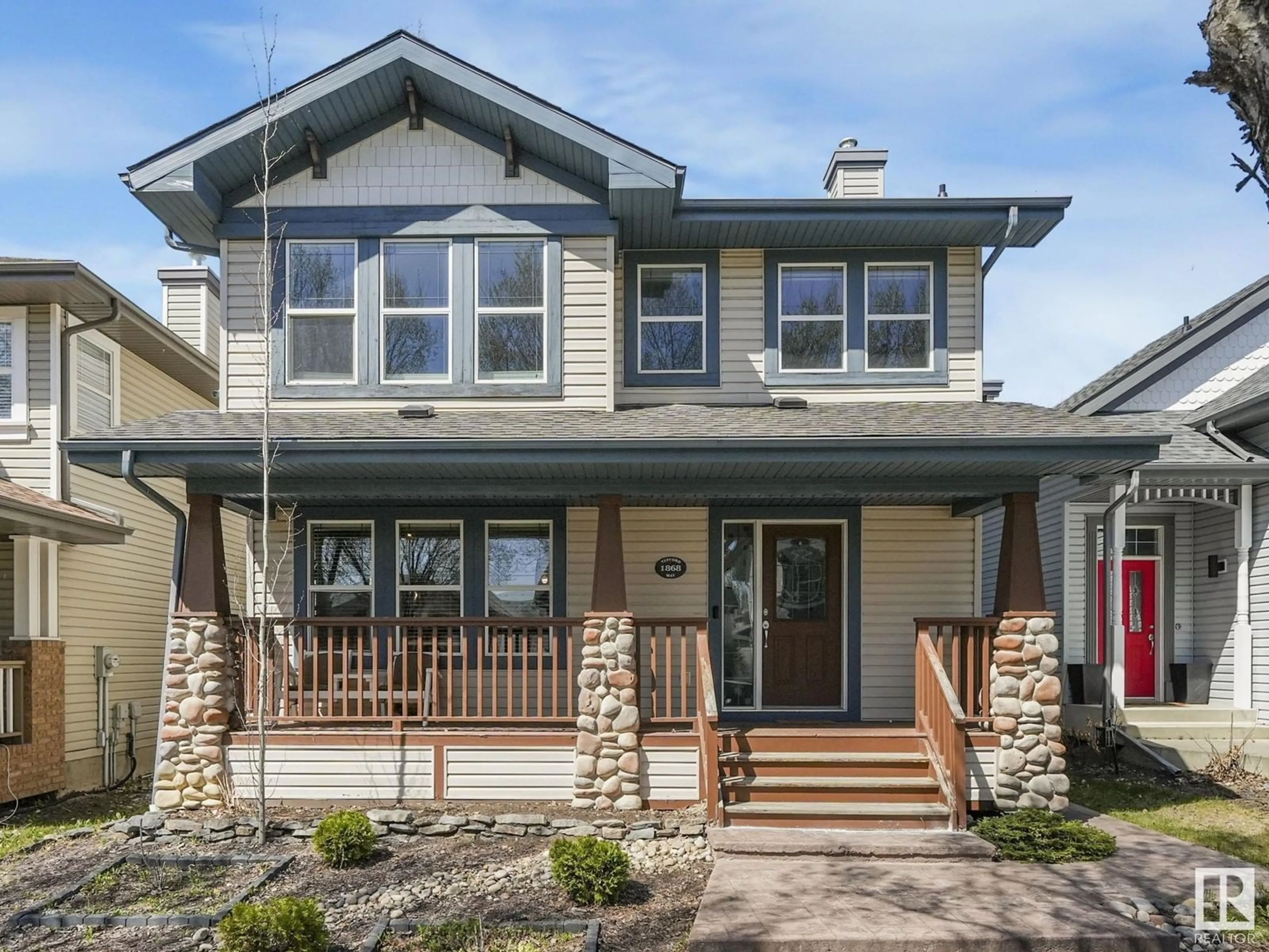 Home with vinyl exterior material, street for 1868 TUFFORD WY, Edmonton Alberta T6R2W4