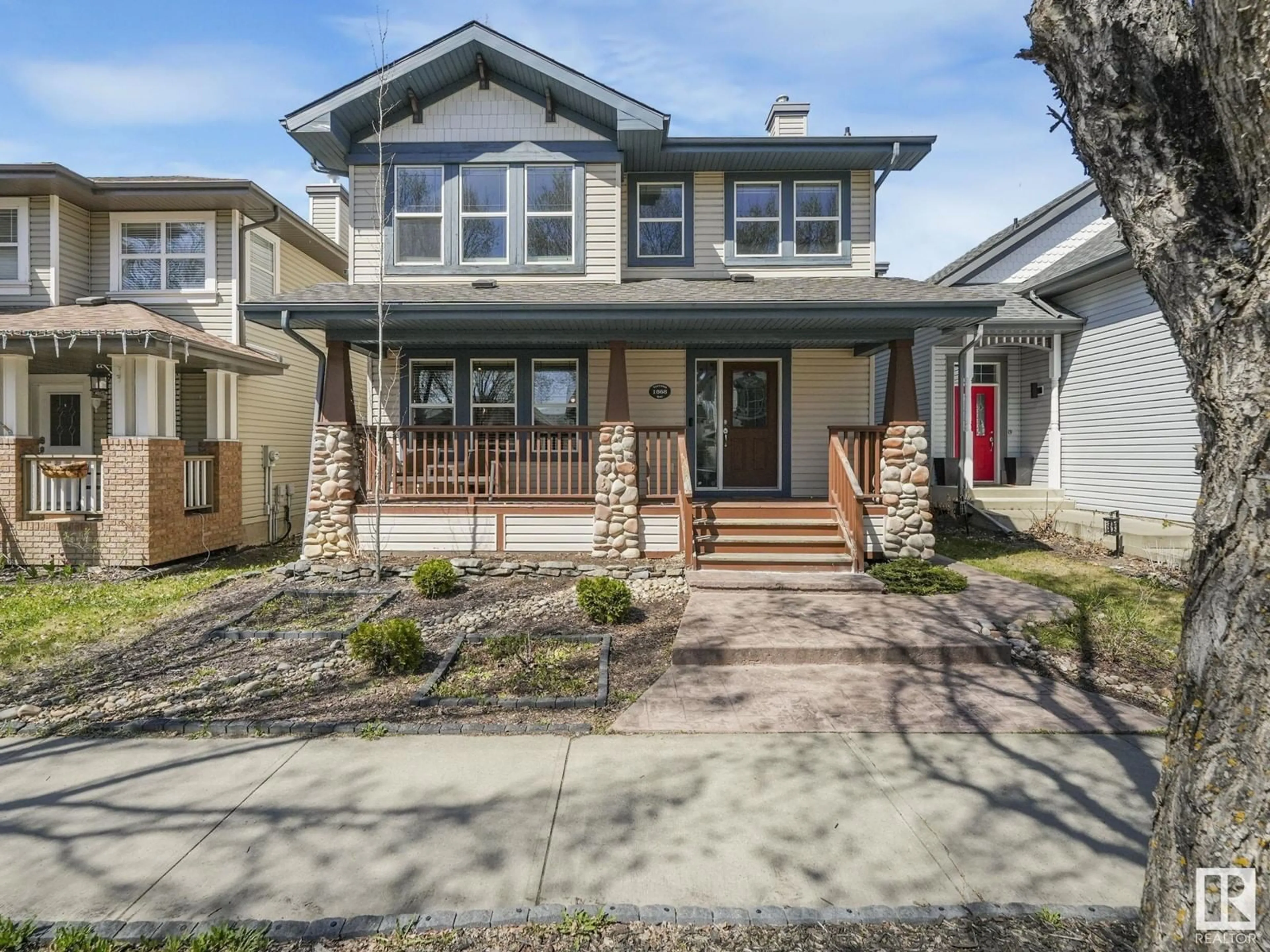 Home with vinyl exterior material, street for 1868 TUFFORD WY, Edmonton Alberta T6R2W4