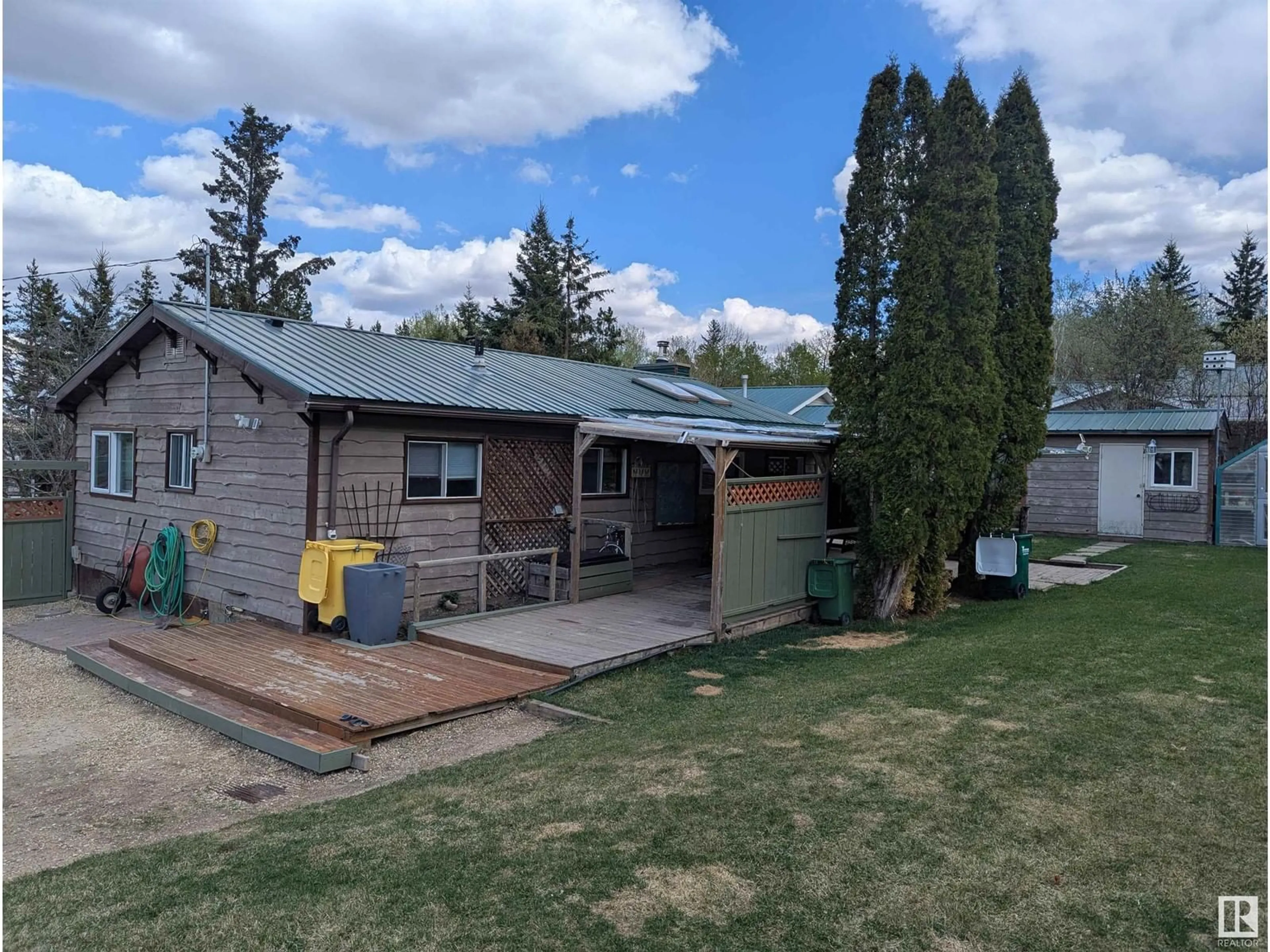 A pic from outside/outdoor area/front of a property/back of a property/a pic from drone, street for 103 - 2120 TWP ROAD 565, Rural Lac Ste. Anne County Alberta T0E1V0