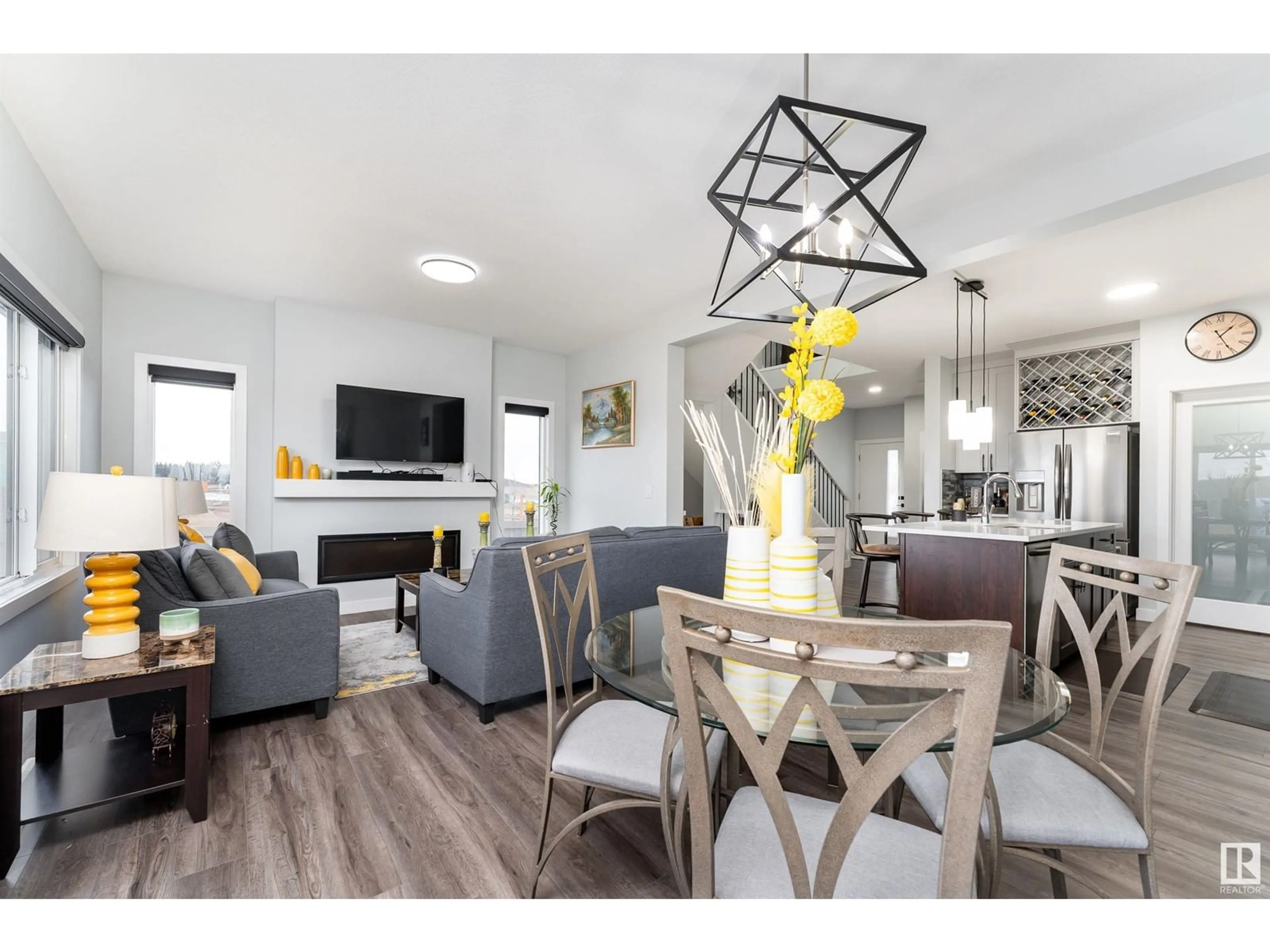 Living room with furniture, wood/laminate floor for 141 LARCH CR, Leduc Alberta T9E1N3