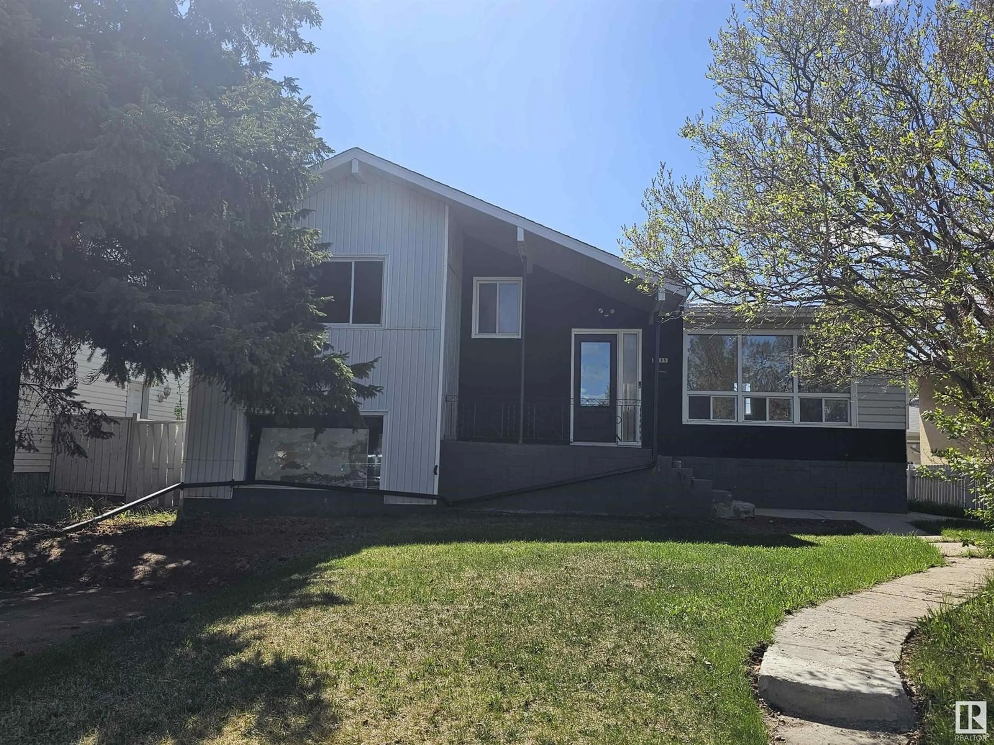 Home with vinyl exterior material, street for 7215 78 AV, Edmonton Alberta T6B0B8