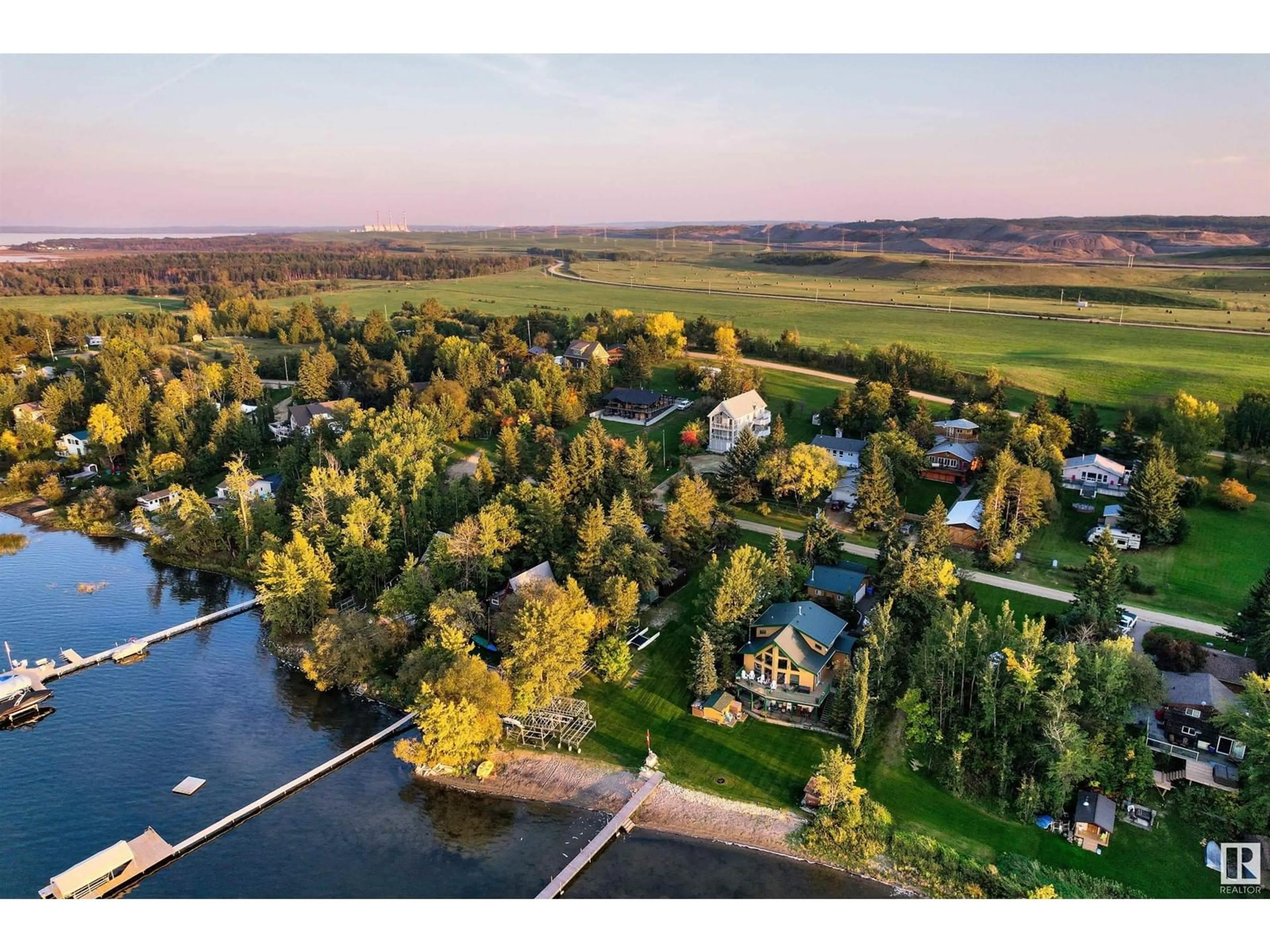 A pic from outside/outdoor area/front of a property/back of a property/a pic from drone, water/lake/river/ocean view for 46 52515 RGE ROAD 52, Rural Parkland County Alberta T0E2B0
