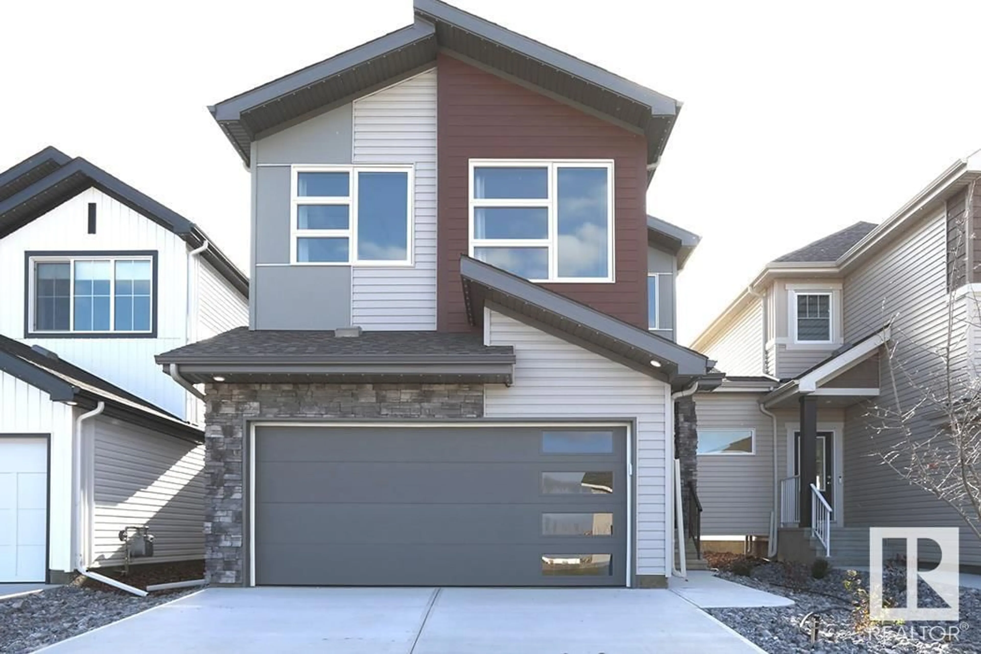 Home with vinyl exterior material, street for 4531 - 4531 71 AV, Beaumont Alberta T4X1L6