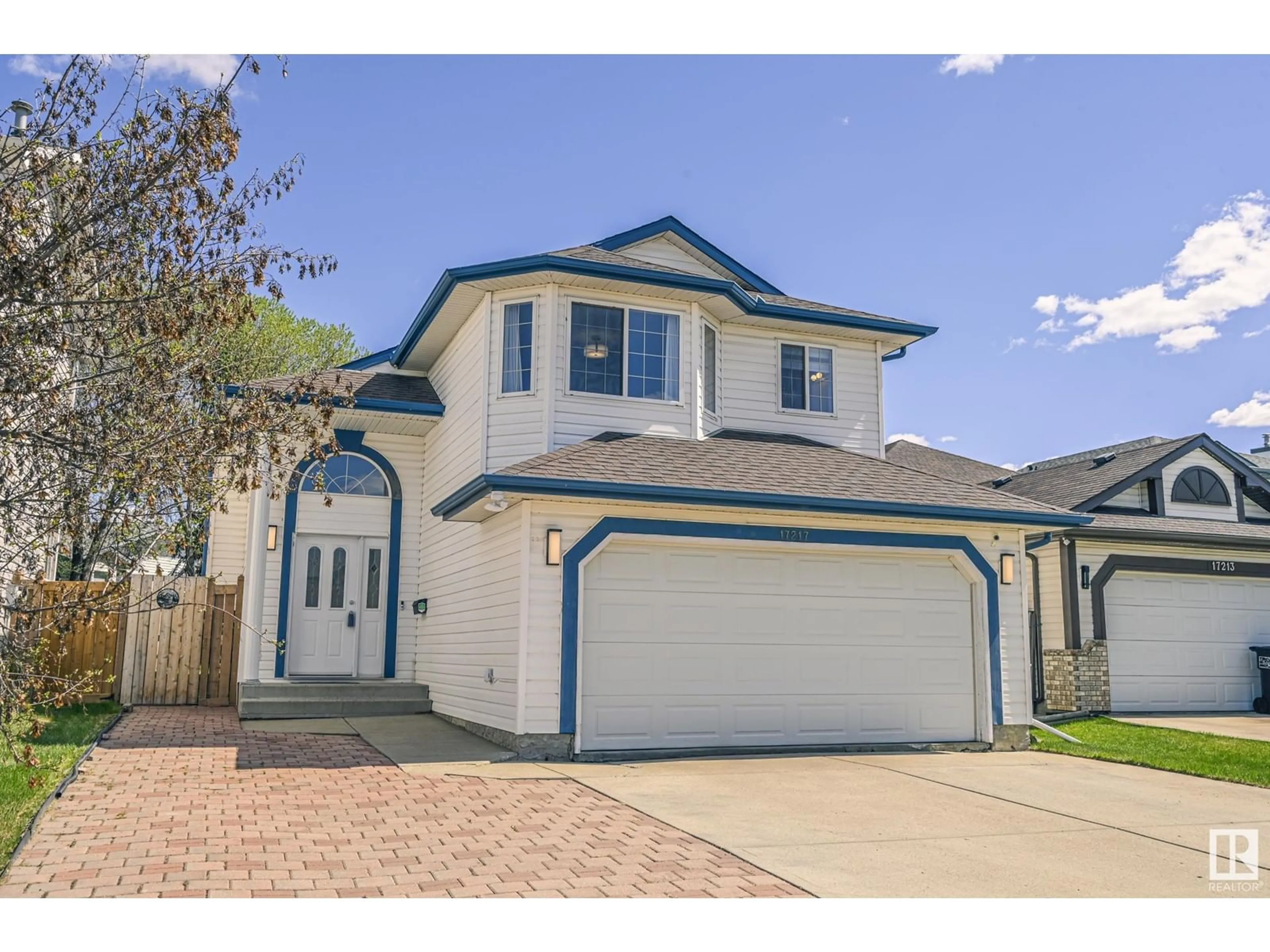 Home with vinyl exterior material, street for NW - 17217 115 ST, Edmonton Alberta T5X5Y1
