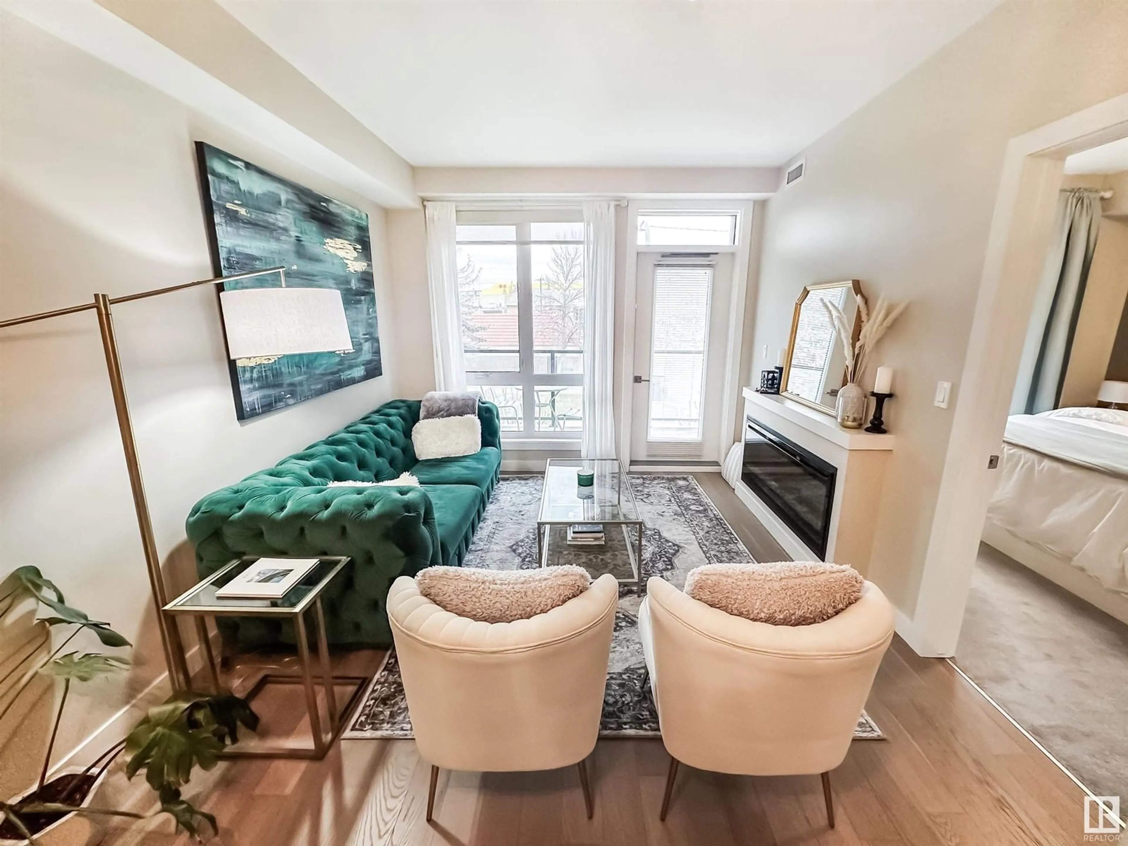 Living room with furniture, wood/laminate floor for #203 - 11710 87 AV, Edmonton Alberta T6G0Y3