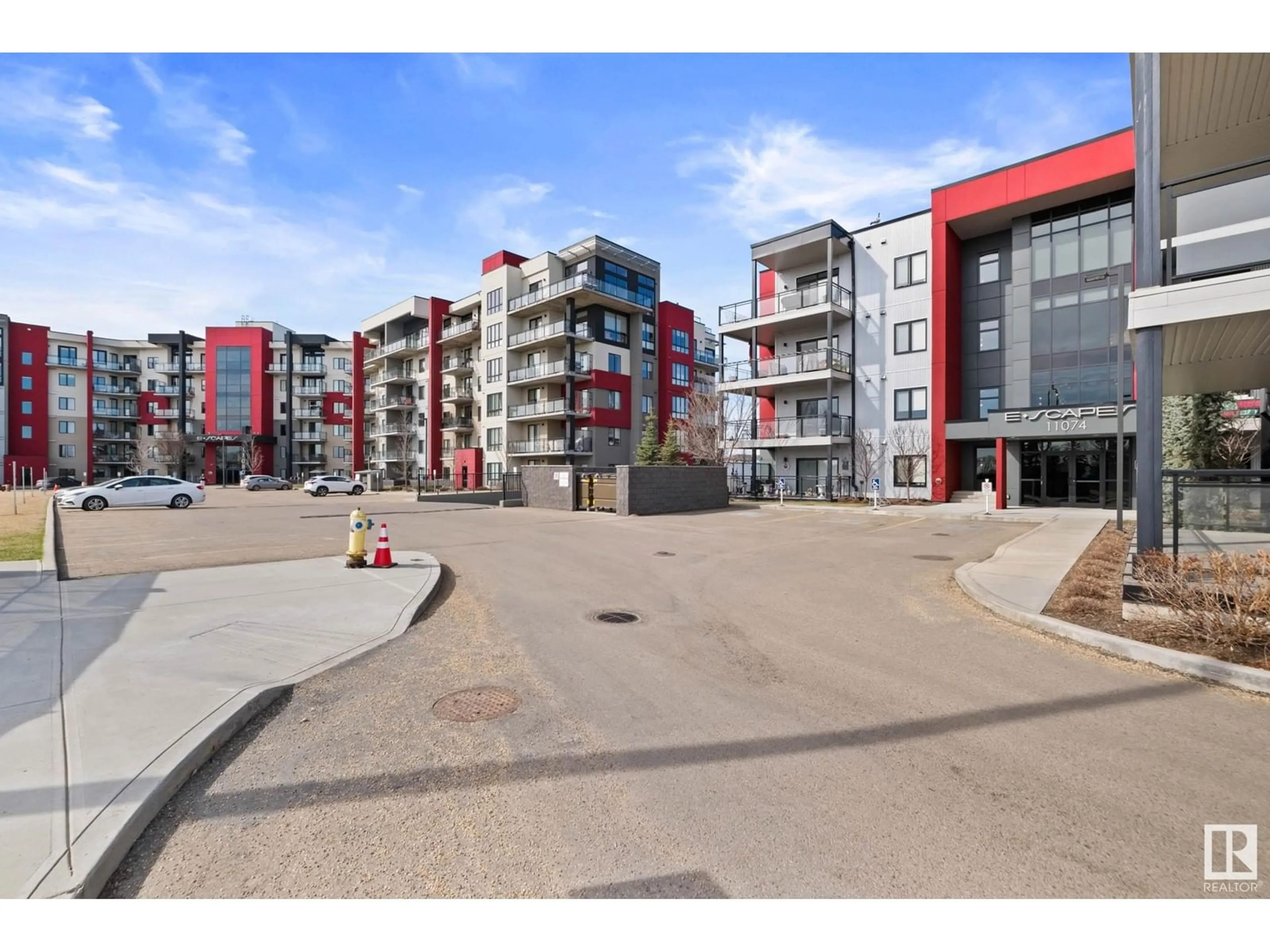 A pic from outside/outdoor area/front of a property/back of a property/a pic from drone, street for 11074 - 126 ELLERSLIE RD, Edmonton Alberta T6W2C2