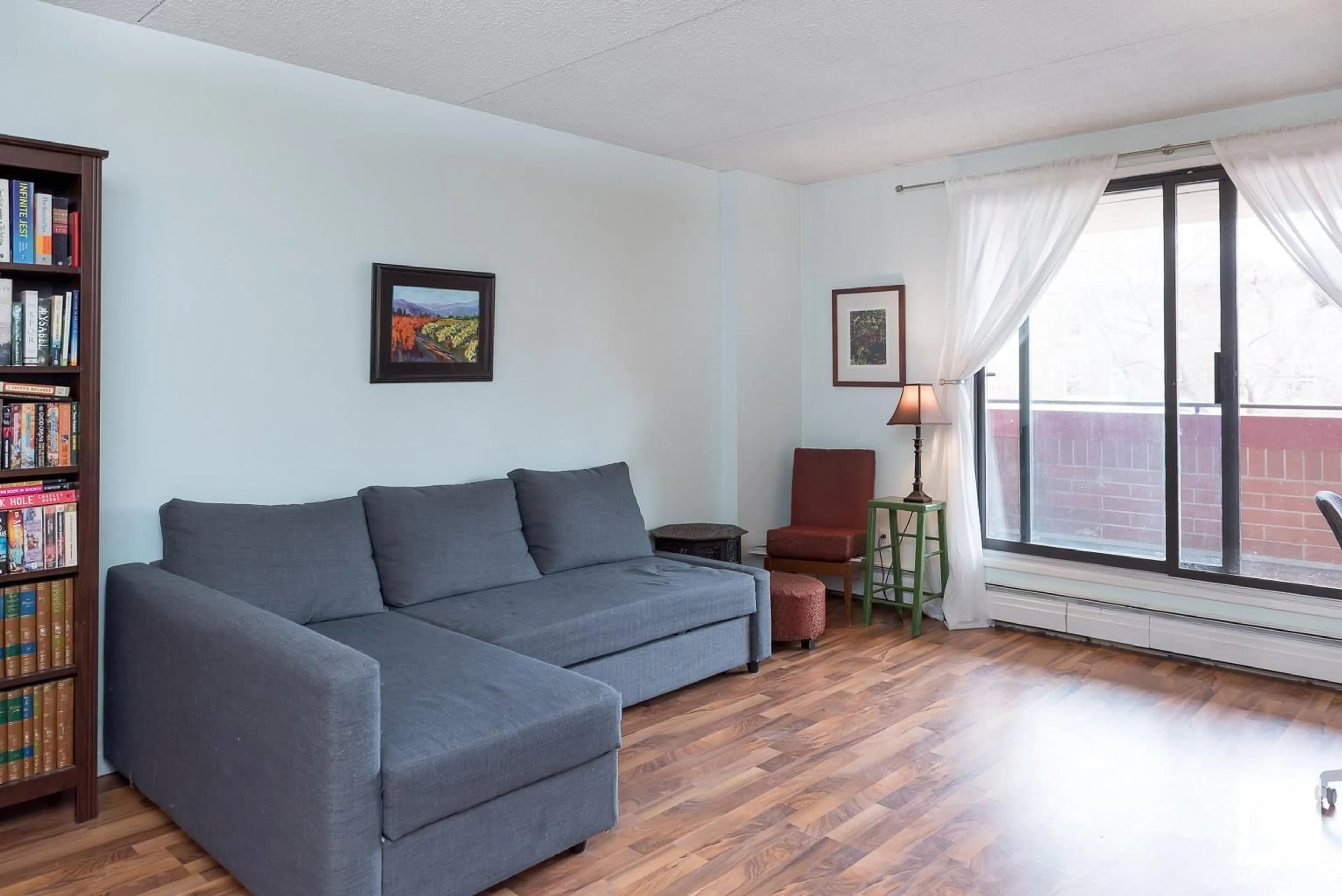 Living room with furniture, wood/laminate floor for #304 - 9917 110 ST, Edmonton Alberta T5K2N4