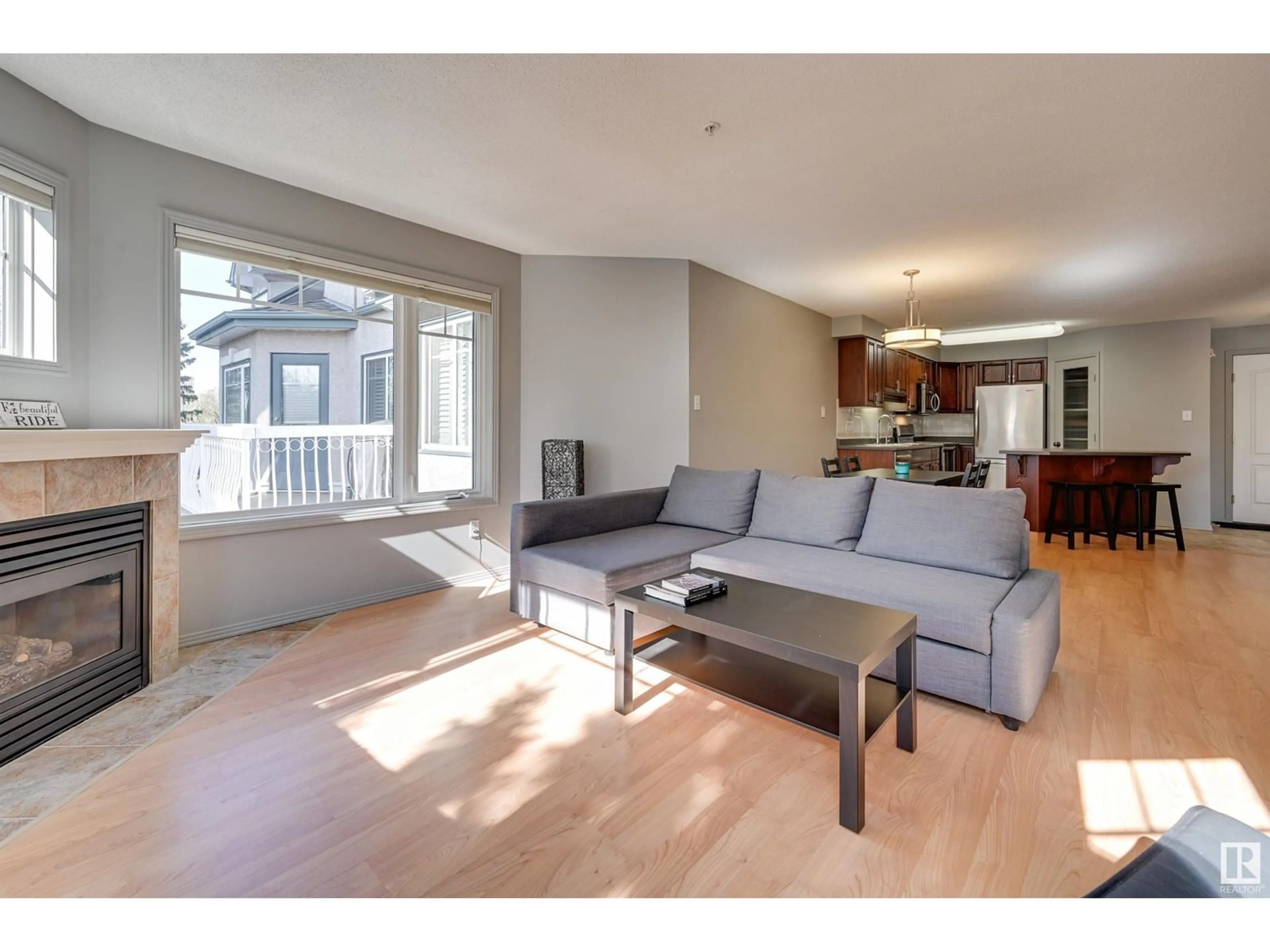 Living room with furniture, wood/laminate floor for #305 - 8909 100 ST, Edmonton Alberta T6E6T4