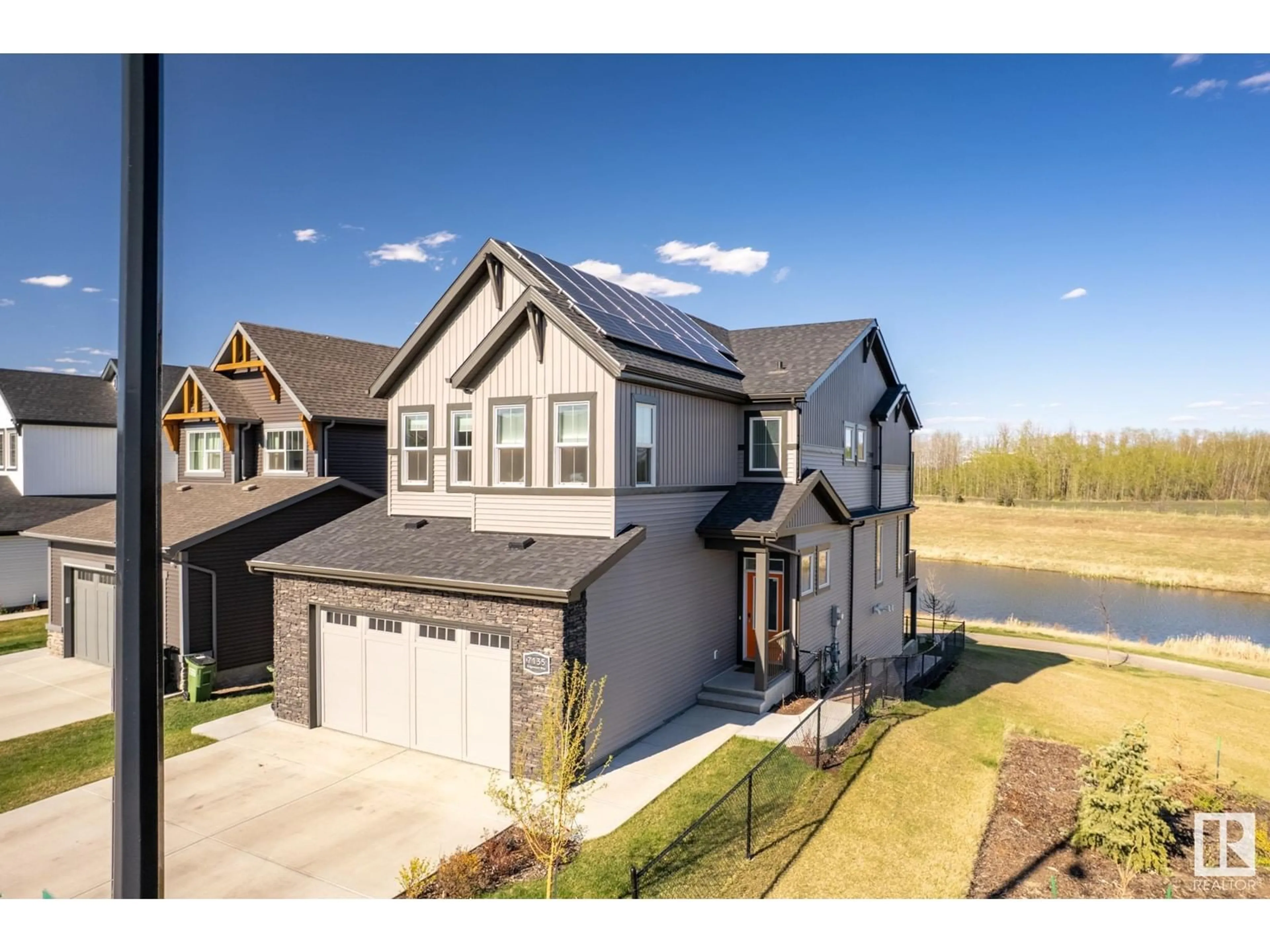 A pic from outside/outdoor area/front of a property/back of a property/a pic from drone, street for 7135 EDGEMONT WY, Edmonton Alberta T6M1K1