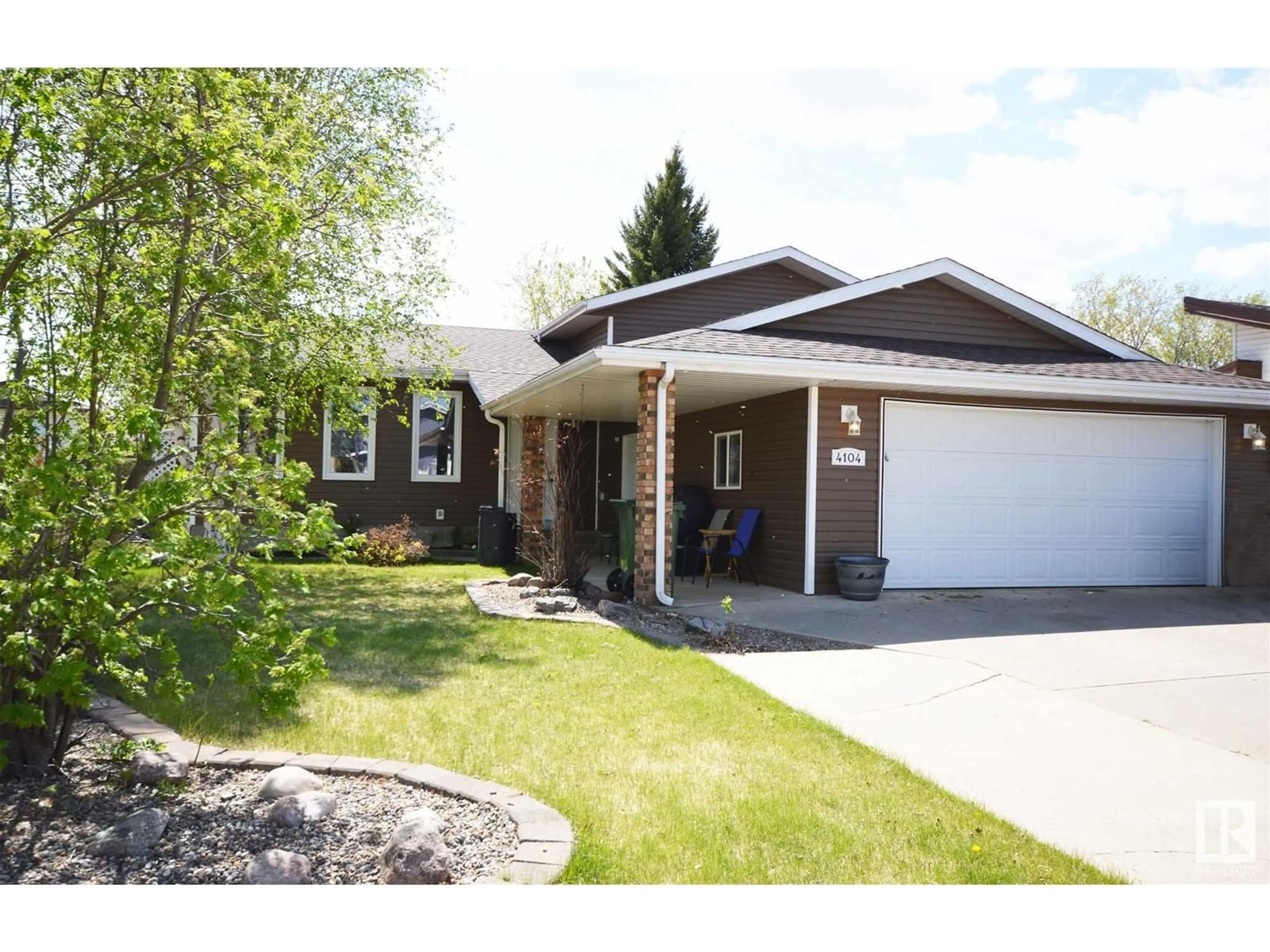 Home with vinyl exterior material, street for 4104 40 AV, Bonnyville Town Alberta T9N1T9