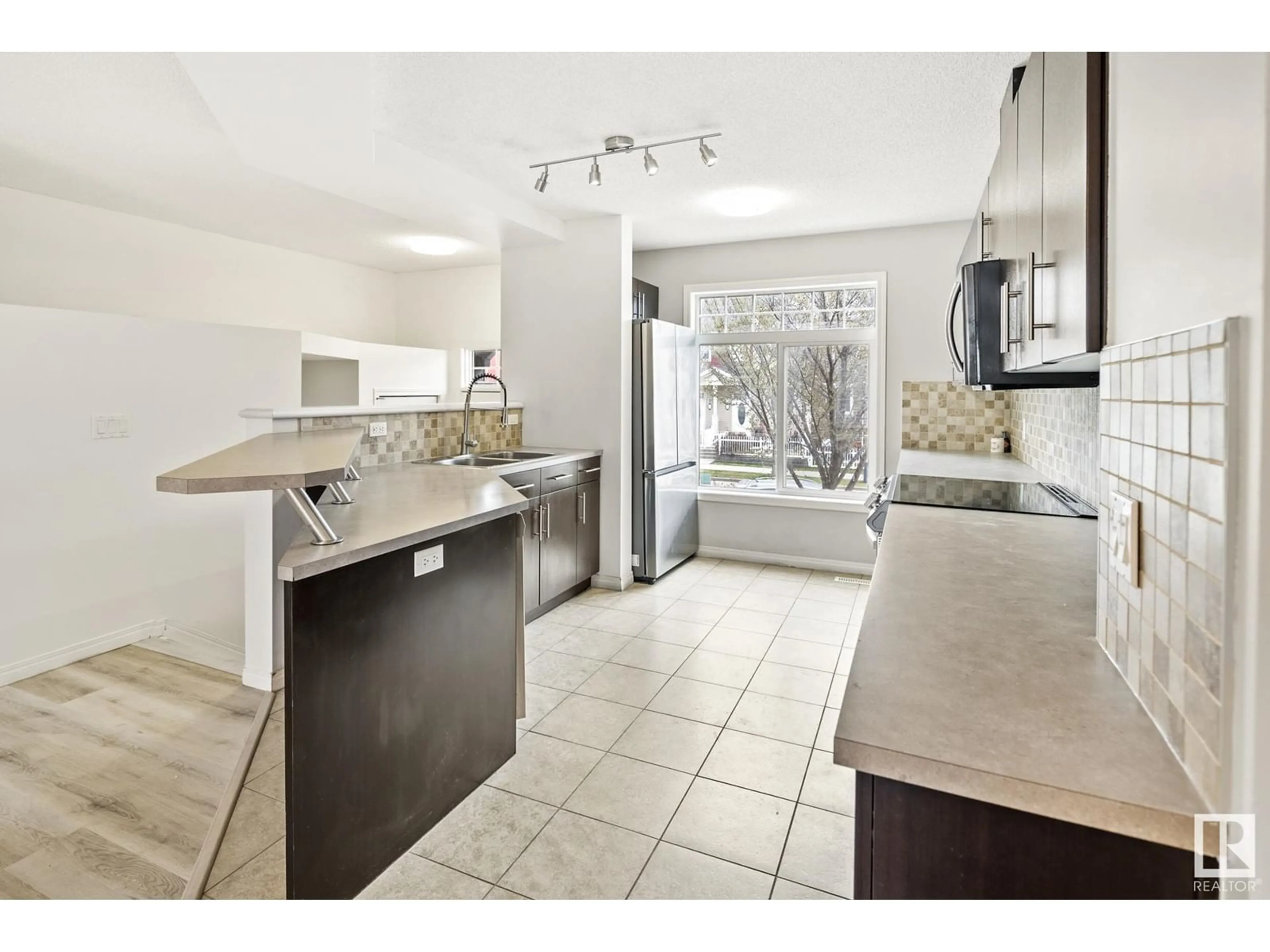 Open concept kitchen, ceramic/tile floor for #5 - 465 HEMINGWAY RD, Edmonton Alberta T6M0J7