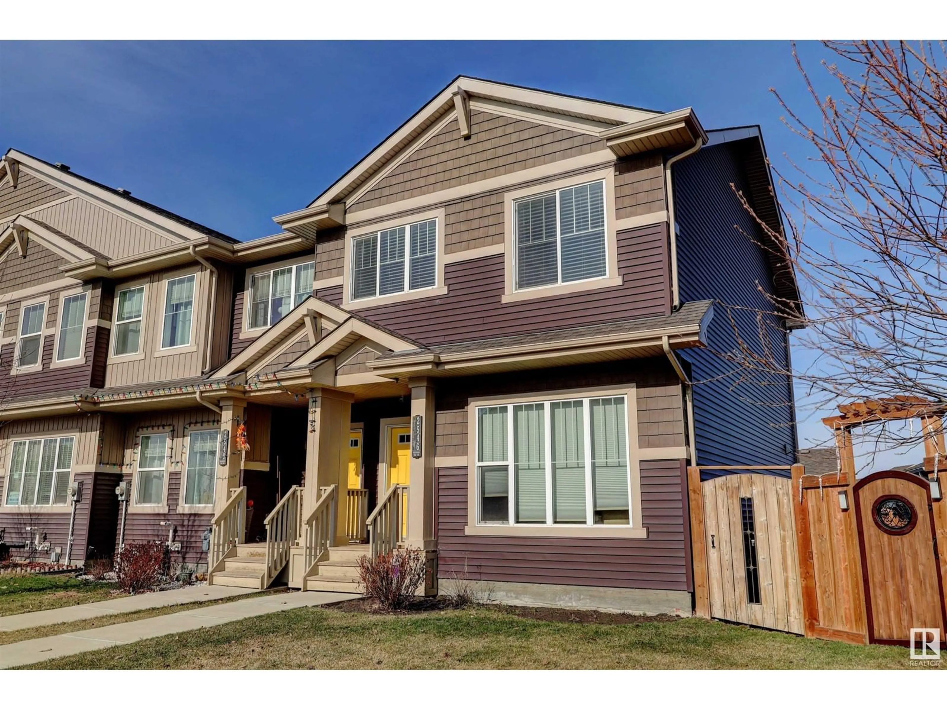 Home with vinyl exterior material, street for 2546 ORCHARDS WY, Edmonton Alberta T6X2E1