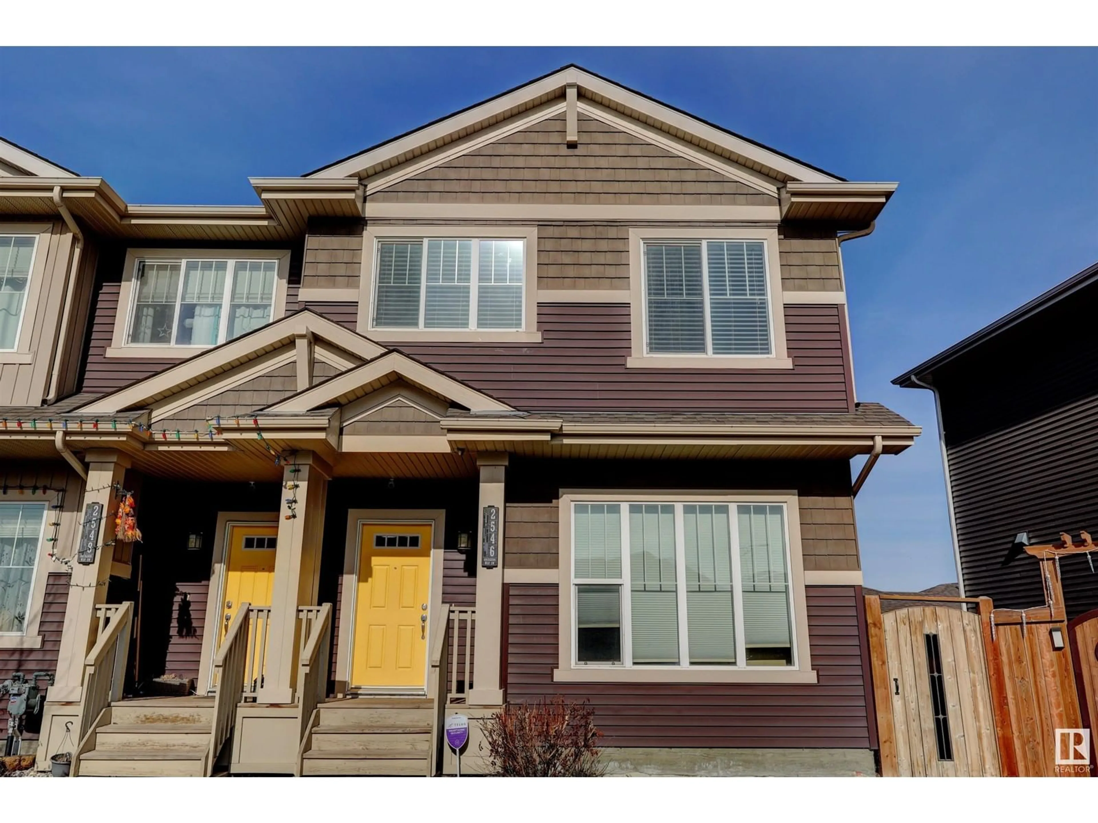 Home with vinyl exterior material, street for 2546 ORCHARDS WY, Edmonton Alberta T6X2E1