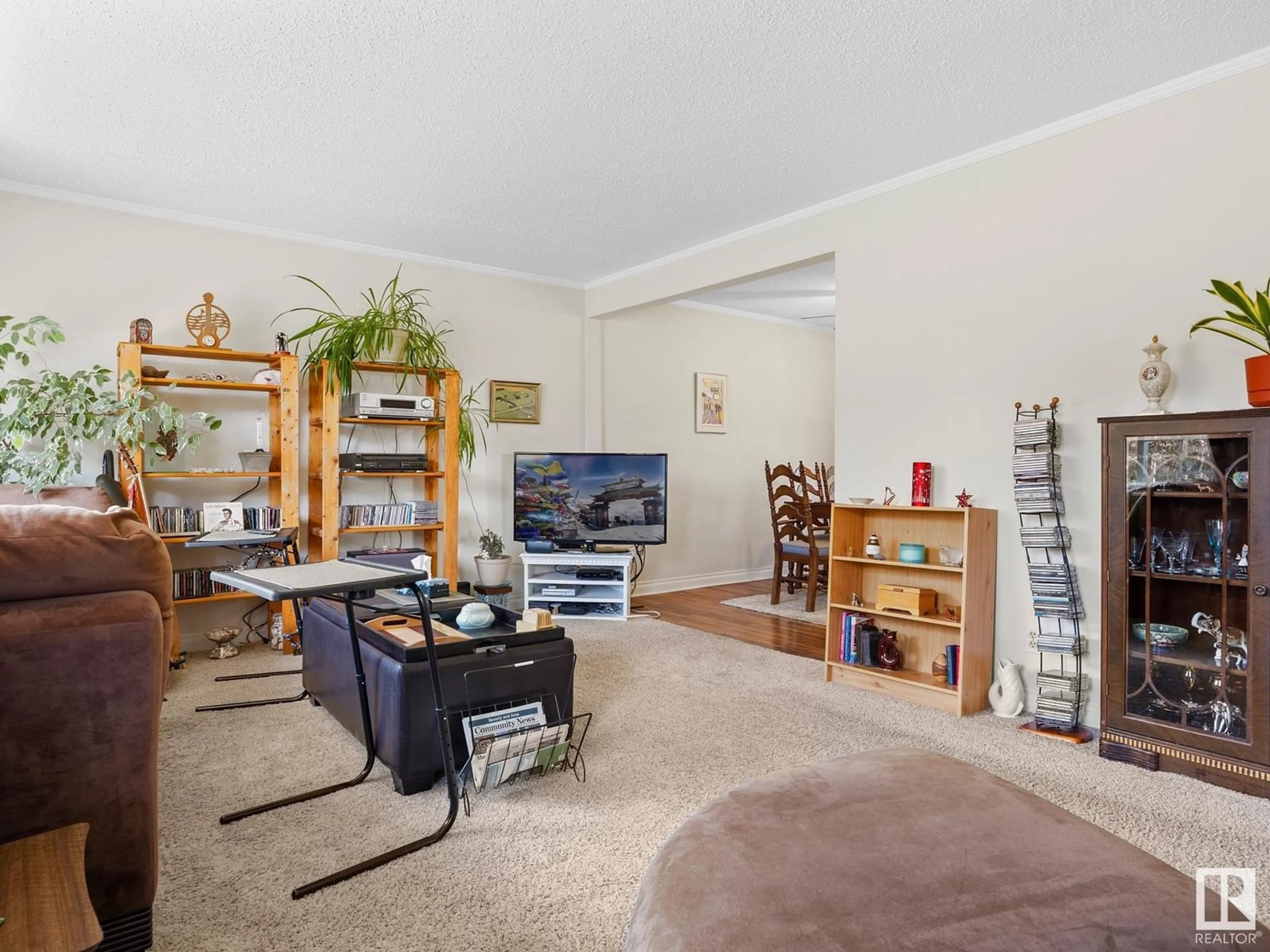 Living room with furniture, unknown for NW - 11930 50 ST, Edmonton Alberta T5W3C2