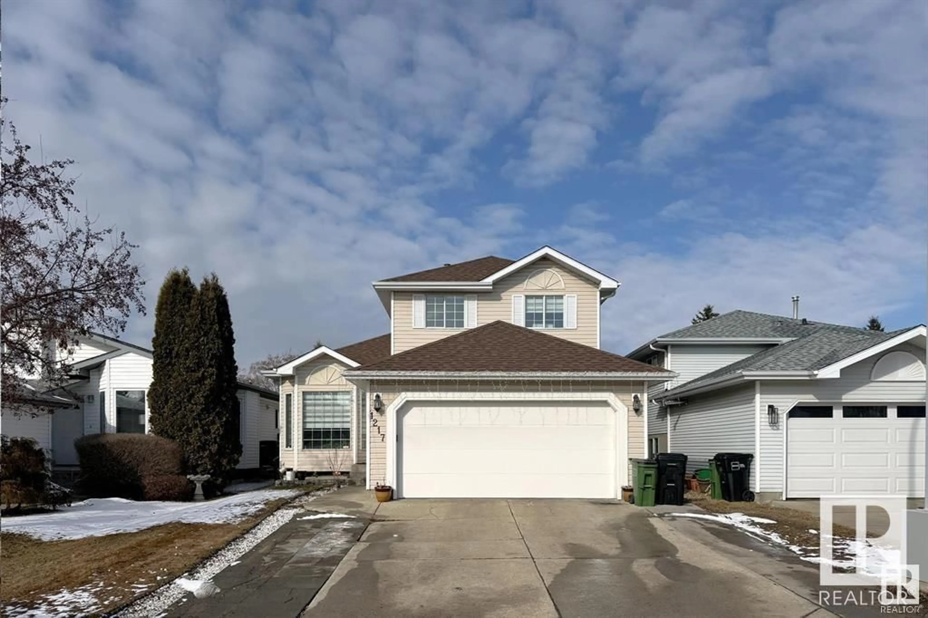 Home with vinyl exterior material, street for 1217 KANE WD, Edmonton Alberta T6L6T7