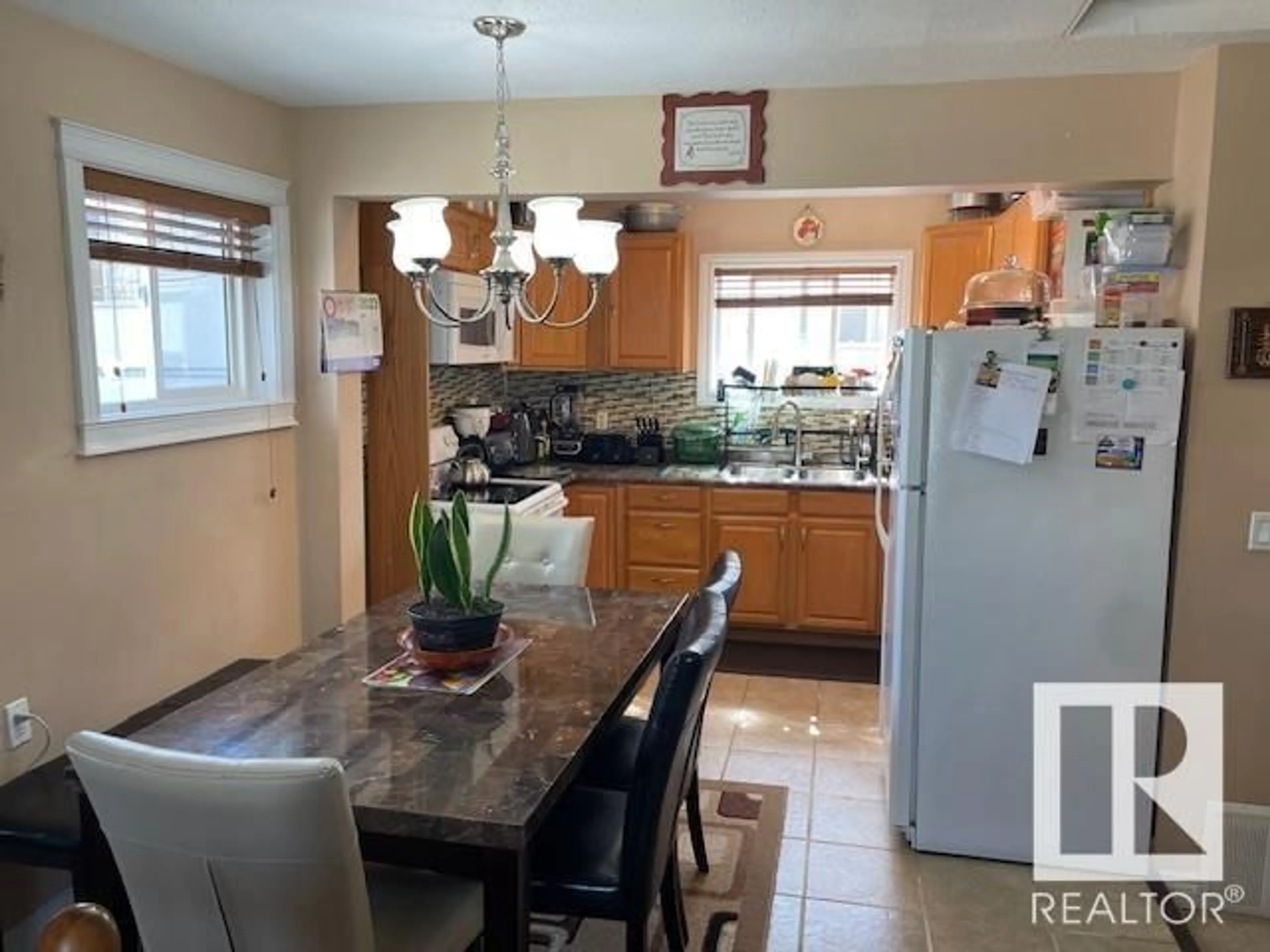 Open concept kitchen, ceramic/tile floor for 12007 87 ST, Edmonton Alberta T5B3N4