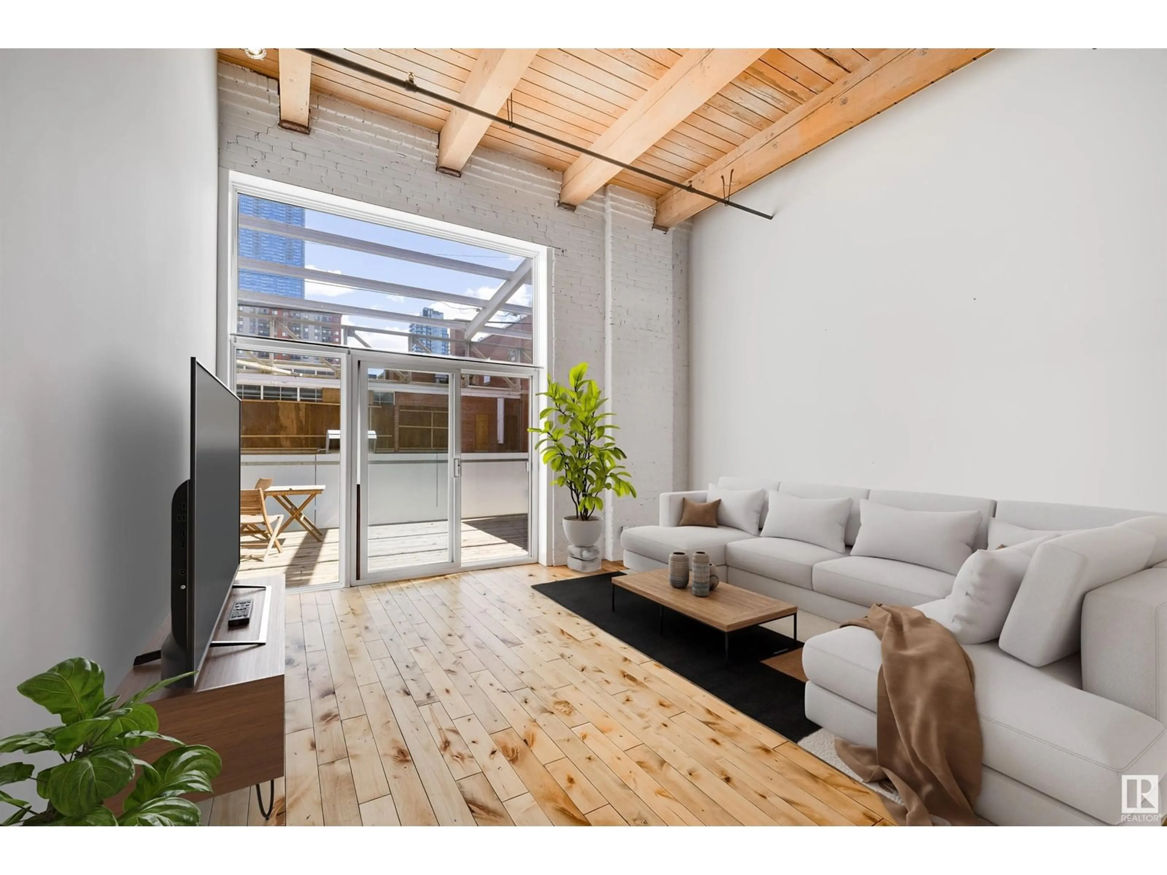 Living room with furniture, wood/laminate floor for #104 - 10309 107 ST, Edmonton Alberta T5J1K3