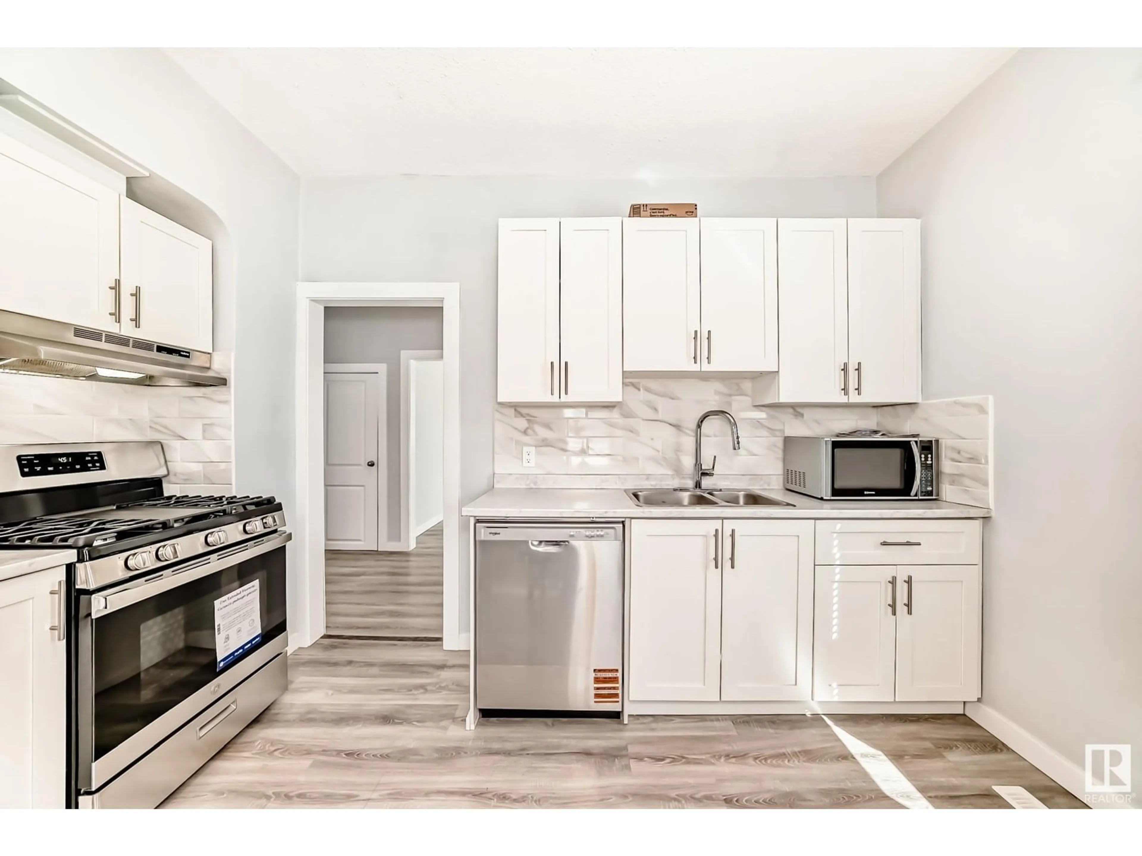 Open concept kitchen, unknown for NW - 11902 90 ST, Edmonton Alberta T5B3Y9