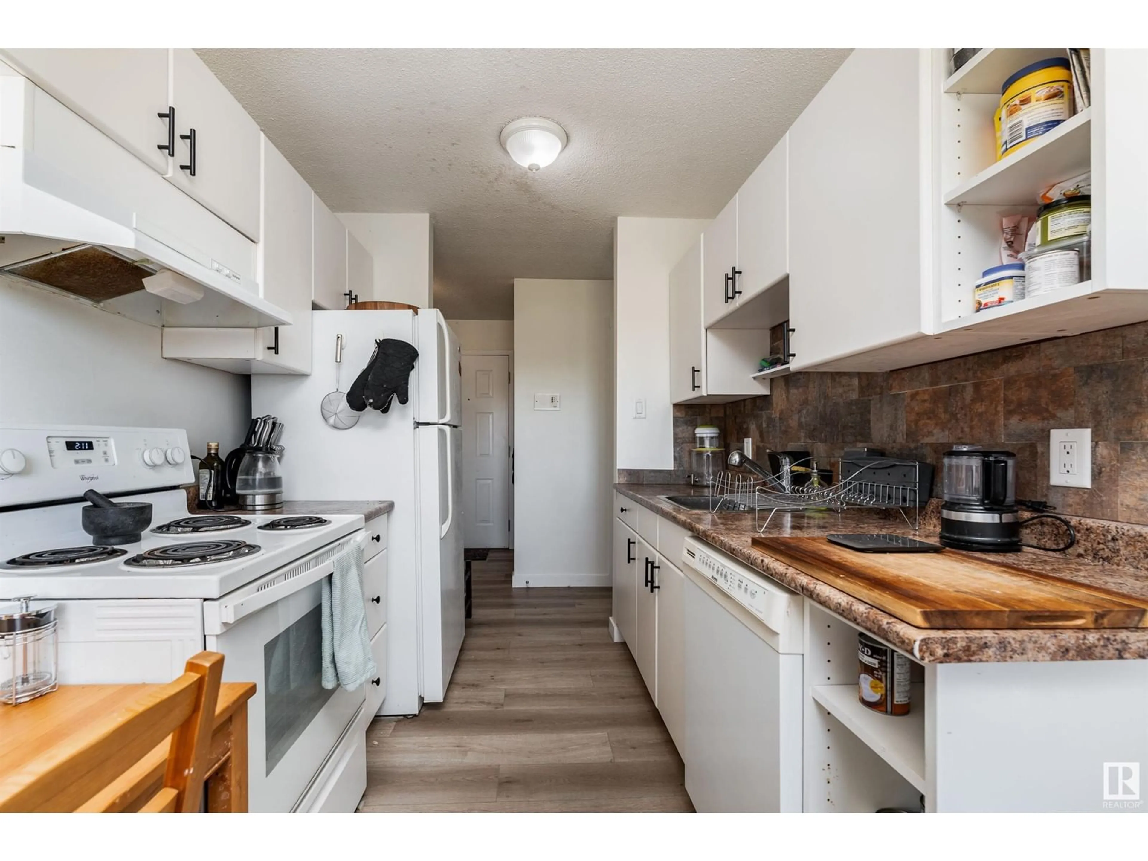 Standard kitchen, wood/laminate floor for #304 - 8930 149 ST, Edmonton Alberta T5R1B8