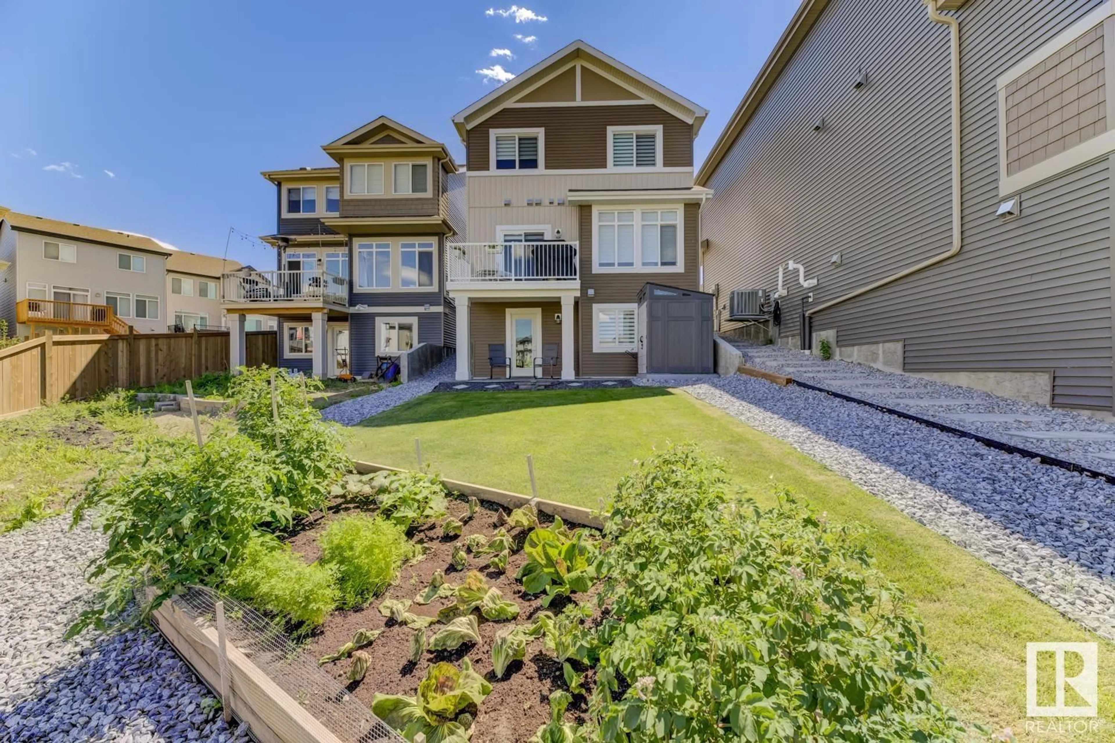 A pic from outside/outdoor area/front of a property/back of a property/a pic from drone, water/lake/river/ocean view for 650 EAGLESON CR, Edmonton Alberta T6M0Y4