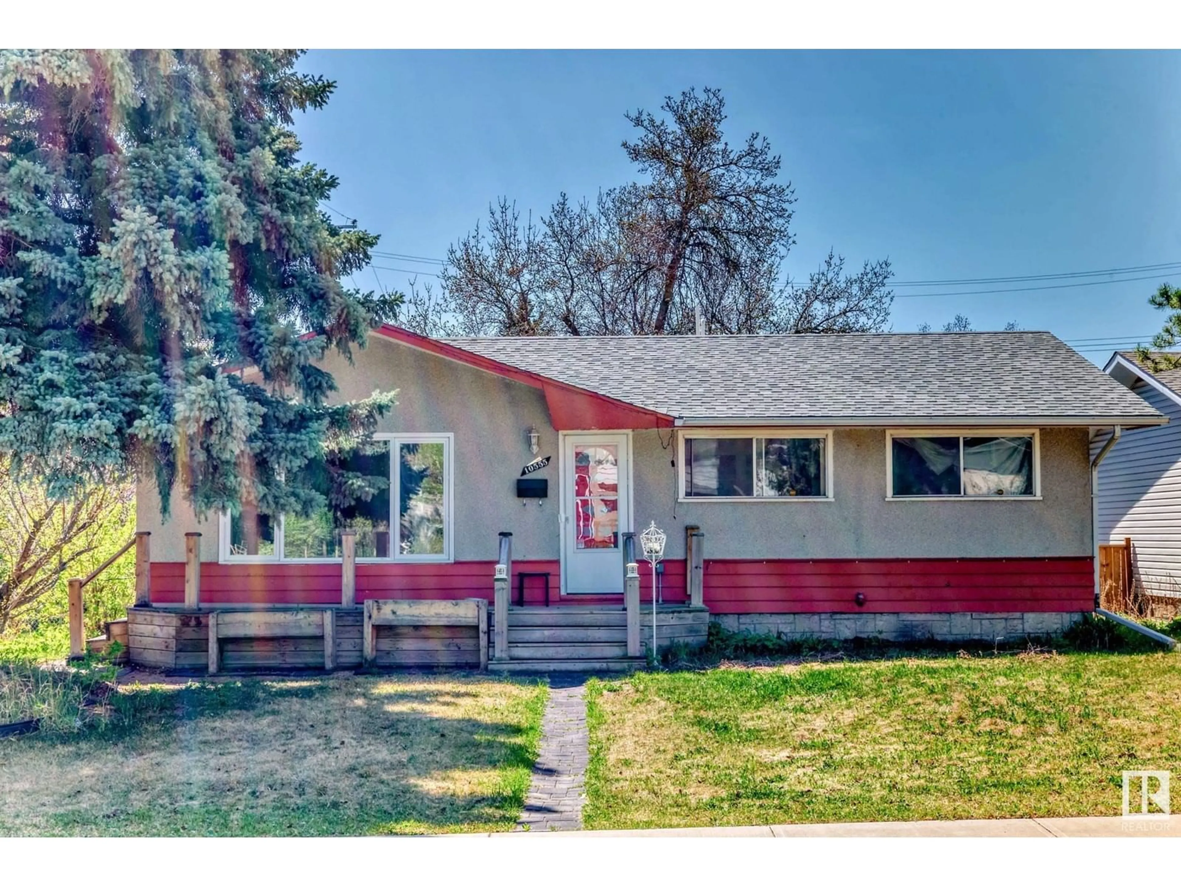 Home with vinyl exterior material, street for 10555 53 AV, Edmonton Alberta T6H0R6