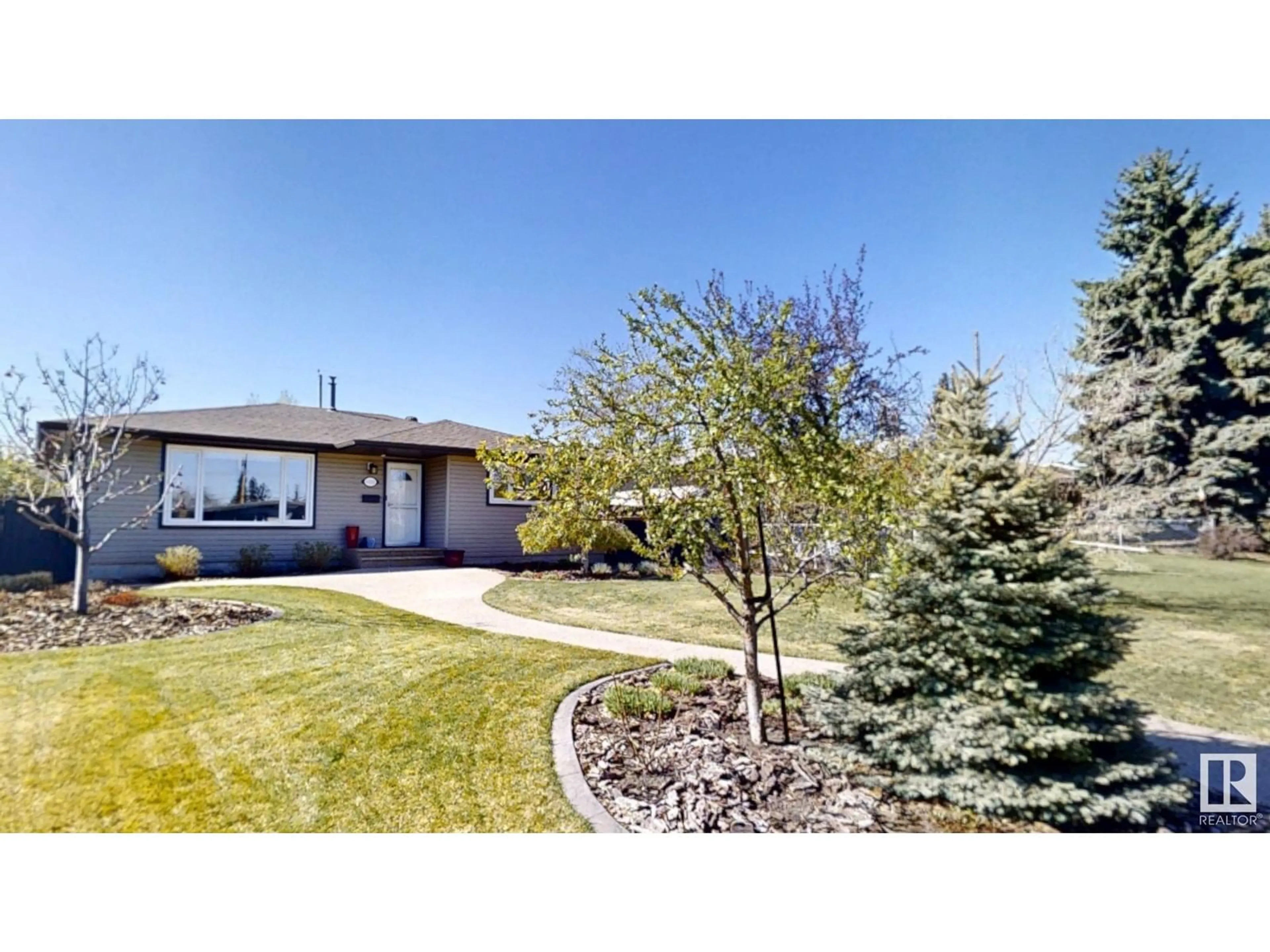 A pic from outside/outdoor area/front of a property/back of a property/a pic from drone, street for 6211 85 AV, Edmonton Alberta T6B0J4