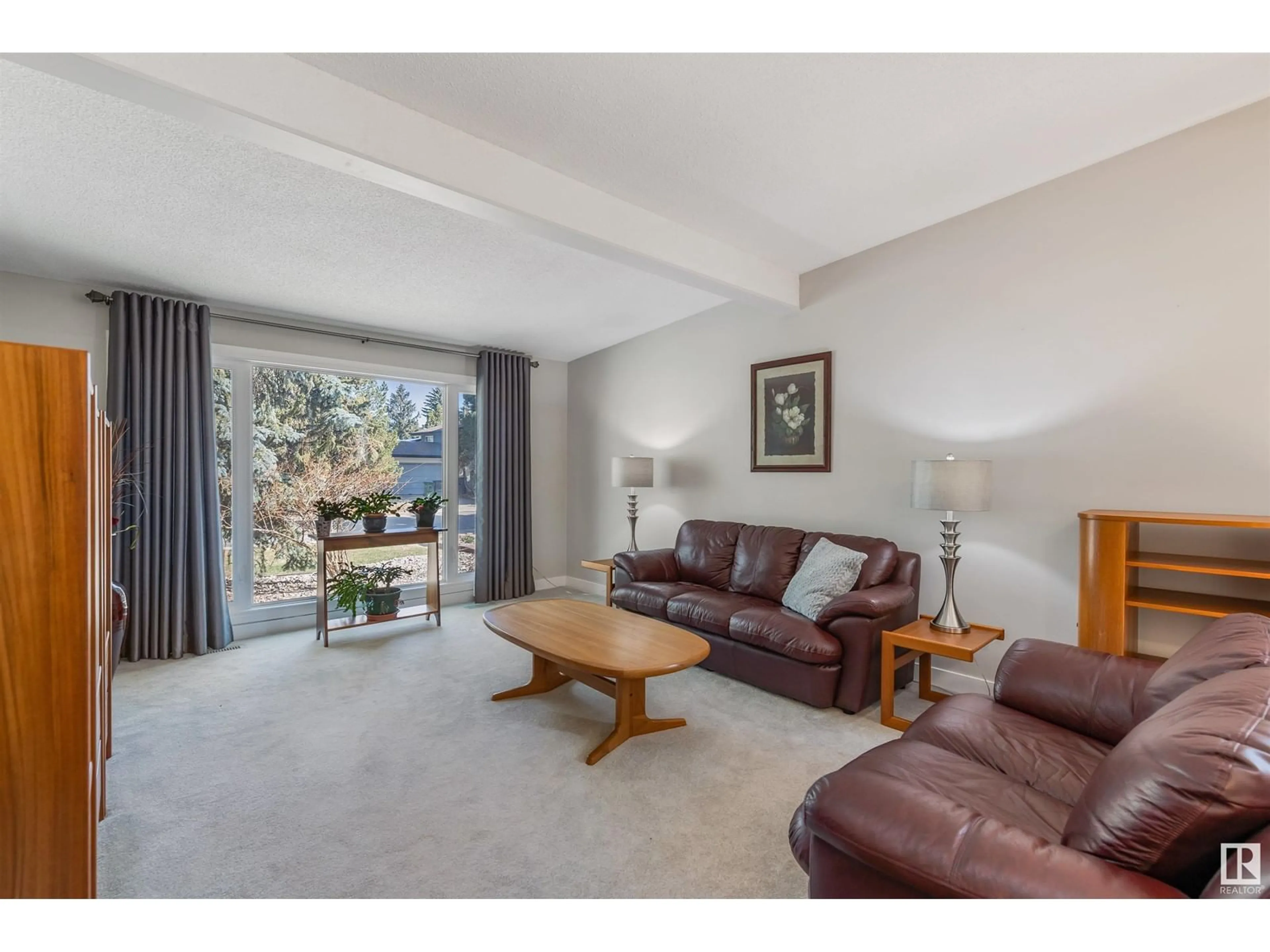 Living room with furniture, unknown for 18519 82 AV, Edmonton Alberta T5T1G2