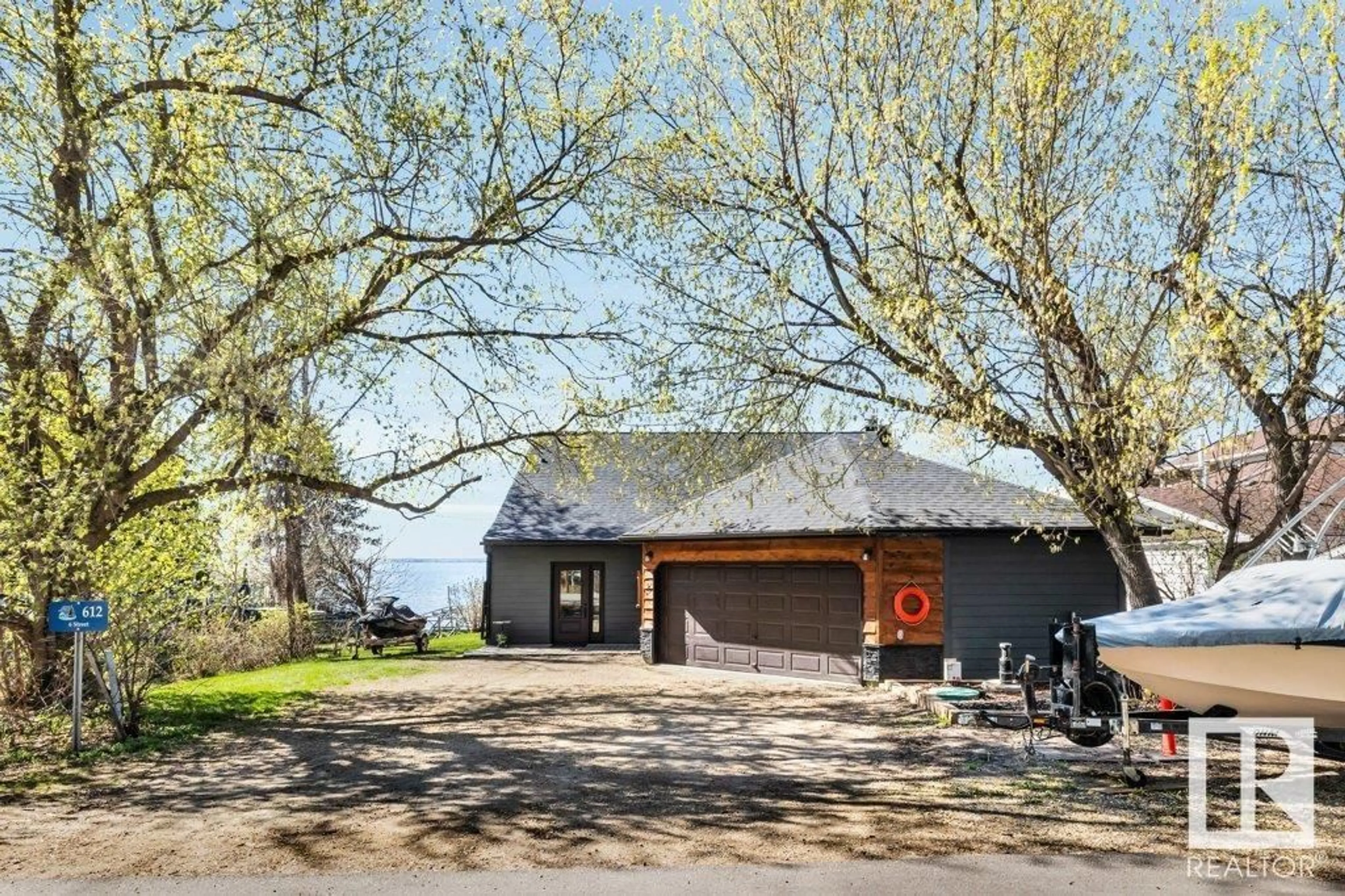 A pic from outside/outdoor area/front of a property/back of a property/a pic from drone, street for 612 6 ST, Rural Lac Ste. Anne County Alberta T0E1E0