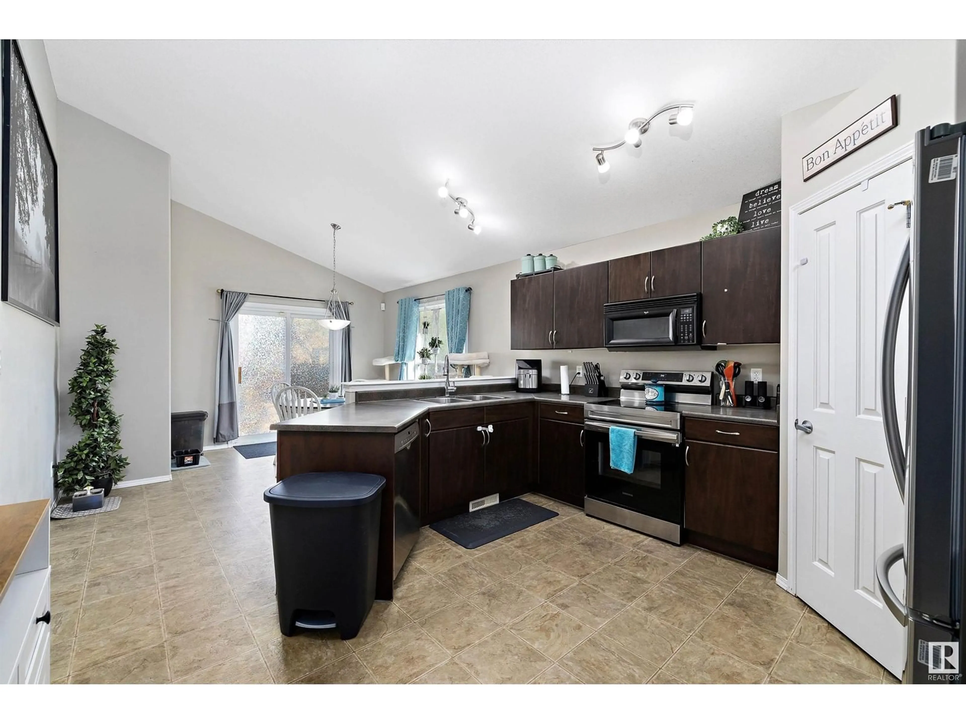 Open concept kitchen, ceramic/tile floor for 59 BONIN CR, Beaumont Alberta T4X1R9