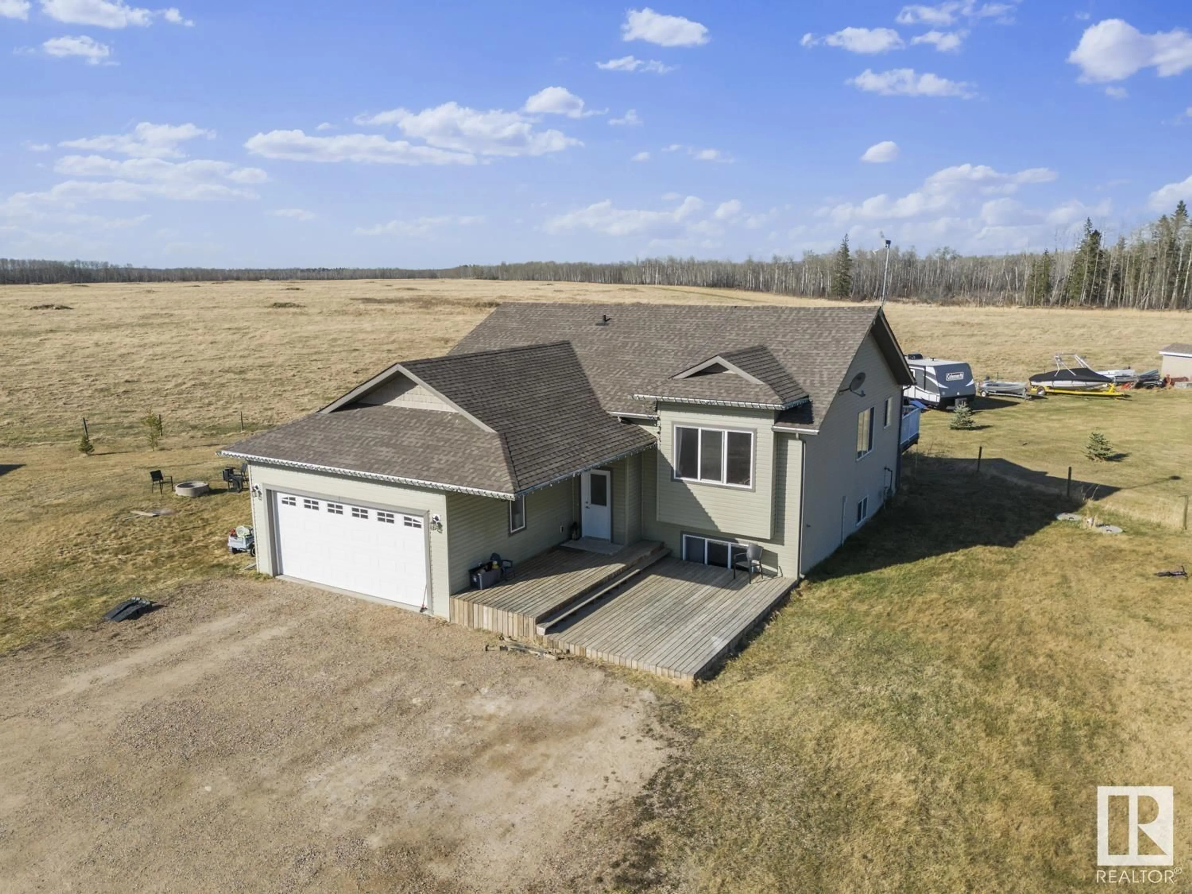 A pic from outside/outdoor area/front of a property/back of a property/a pic from drone, building for 42004 TWP RD 614, Rural Bonnyville M.D. Alberta T9M1P2