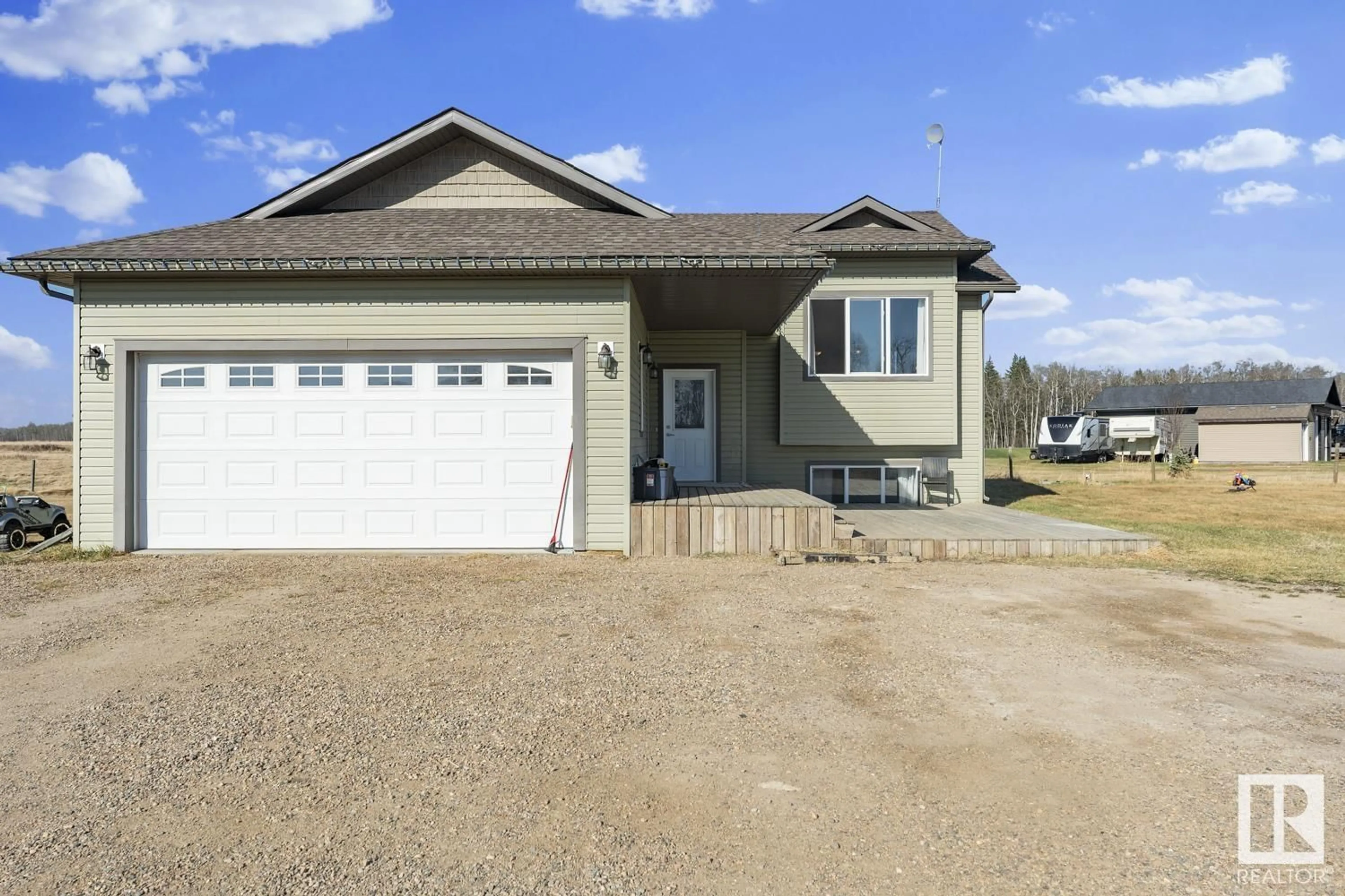 Home with vinyl exterior material, street for 42004 TWP RD 614, Rural Bonnyville M.D. Alberta T9M1P2