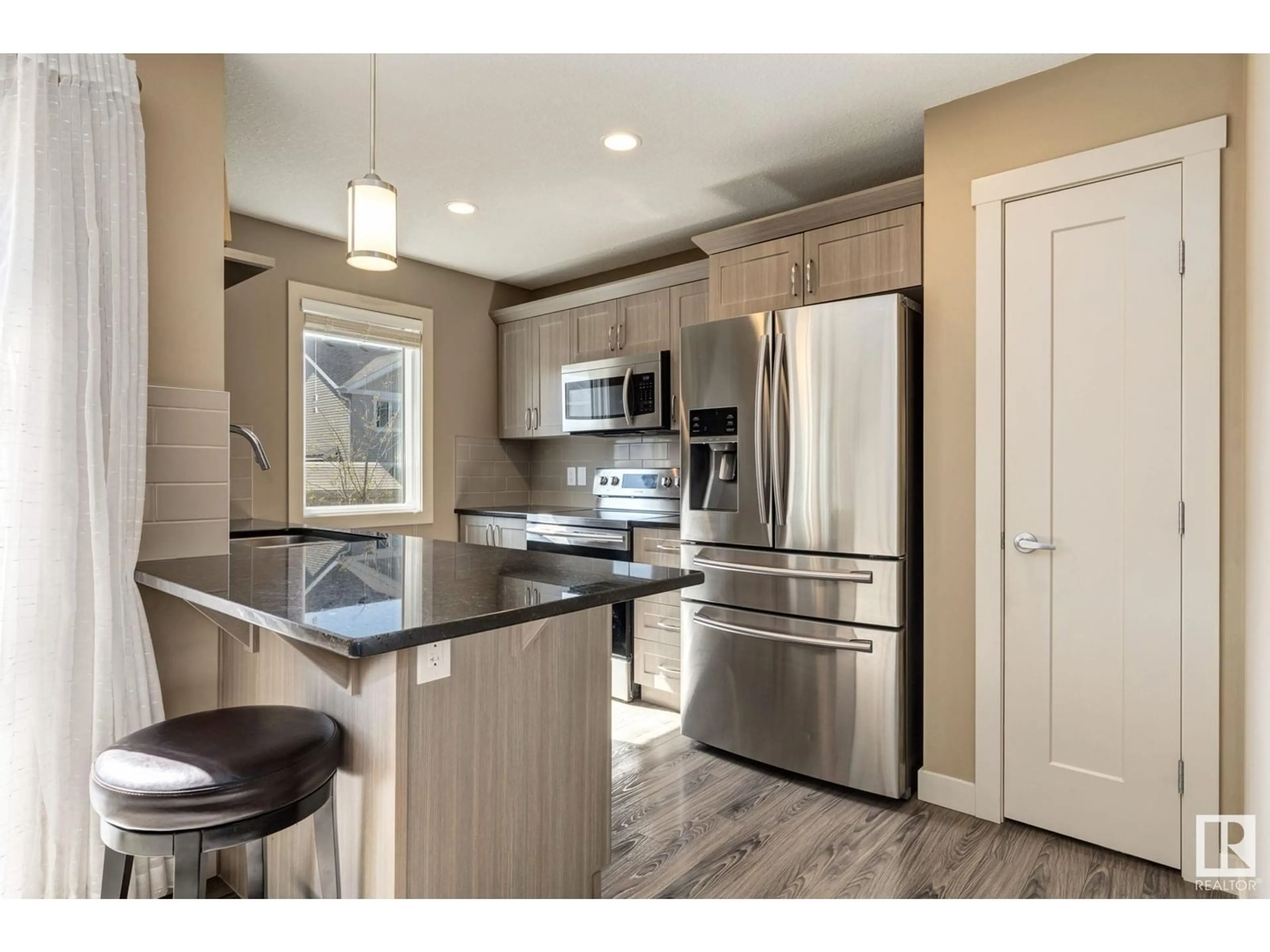 Open concept kitchen, unknown for #57 - 1391 STARLING DR, Edmonton Alberta T5S0L3