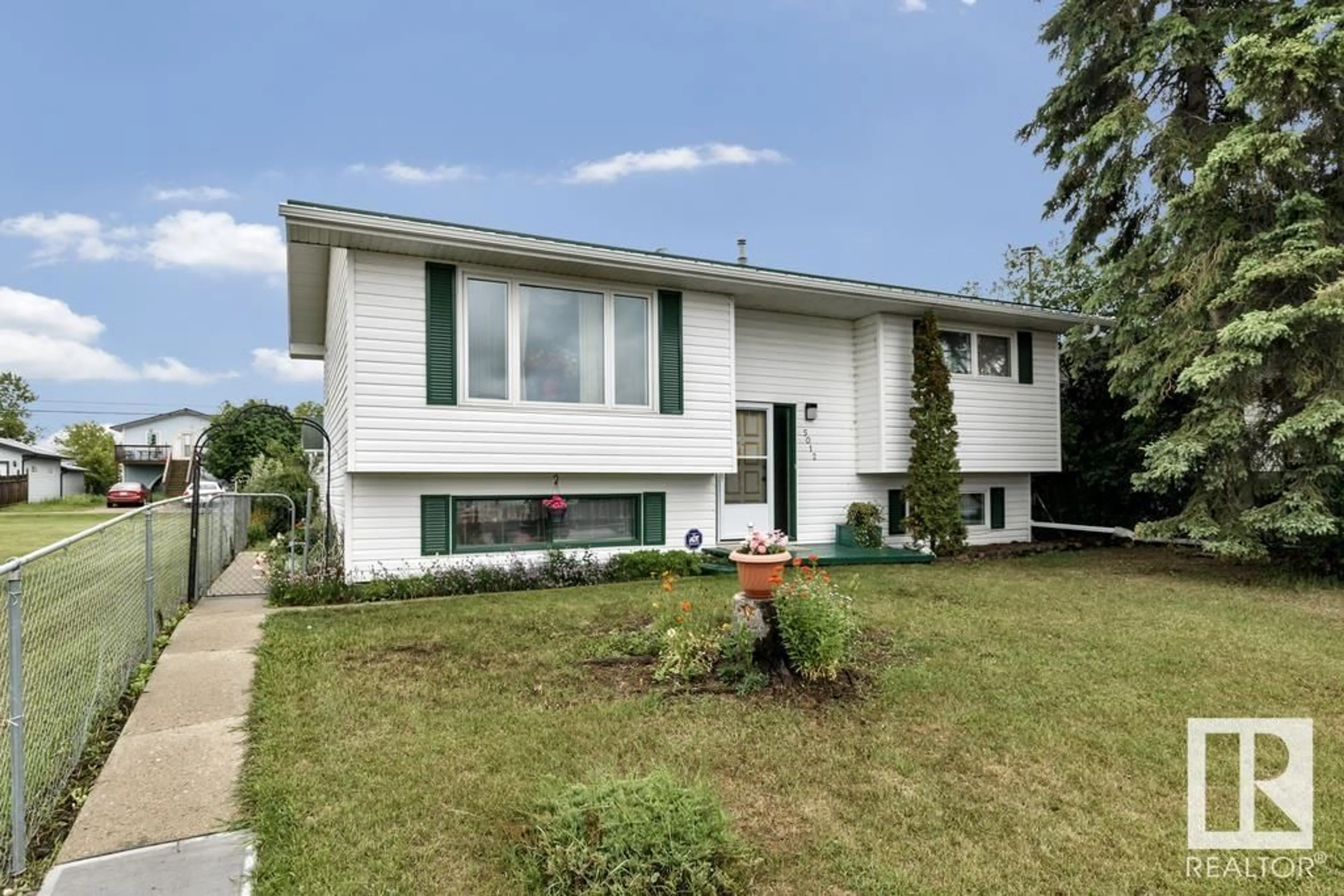 Home with vinyl exterior material, street for 5012 53 AV, Bonnyville Town Alberta T9N2E3