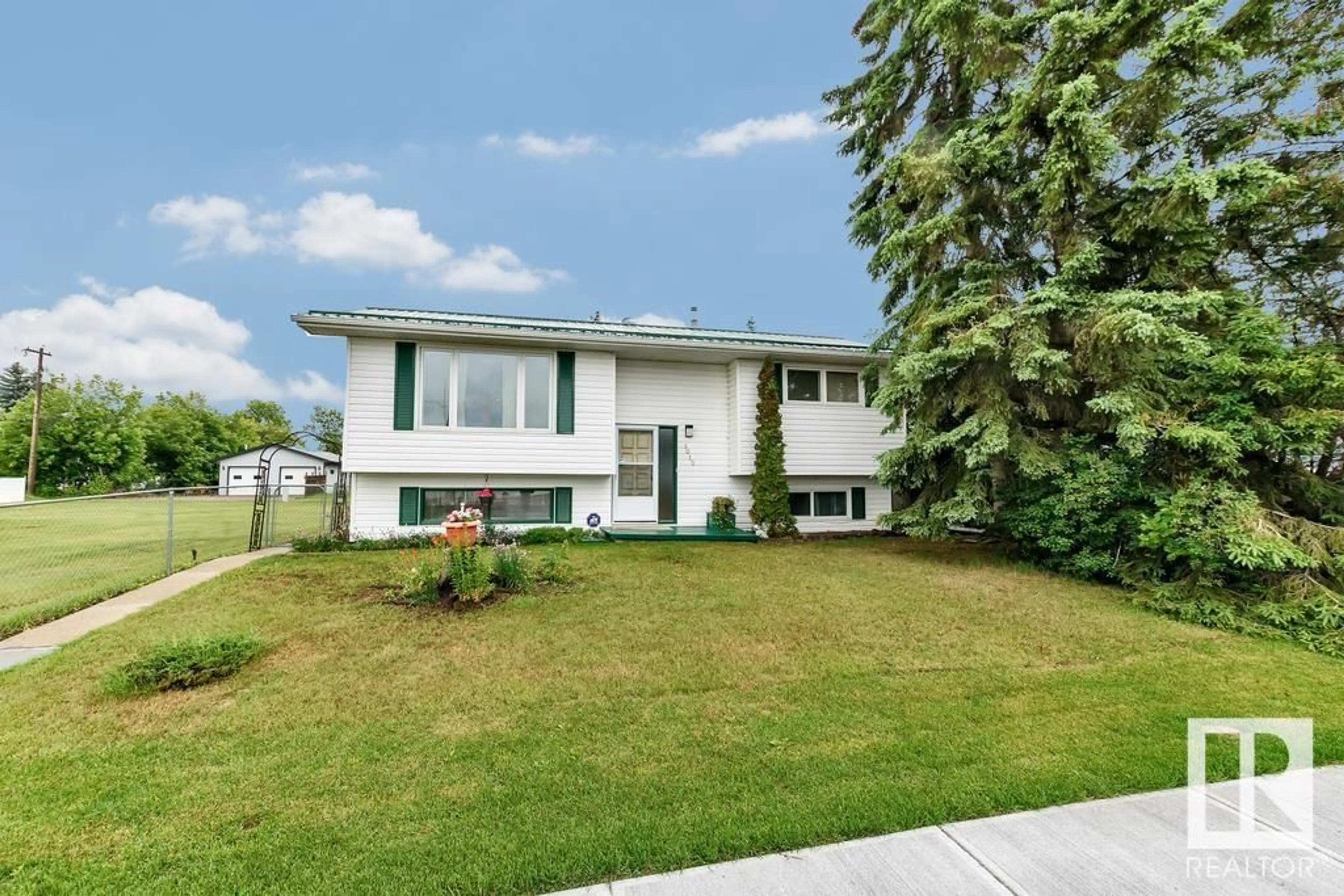 Home with vinyl exterior material, street for 5012 53 AV, Bonnyville Town Alberta T9N2E3