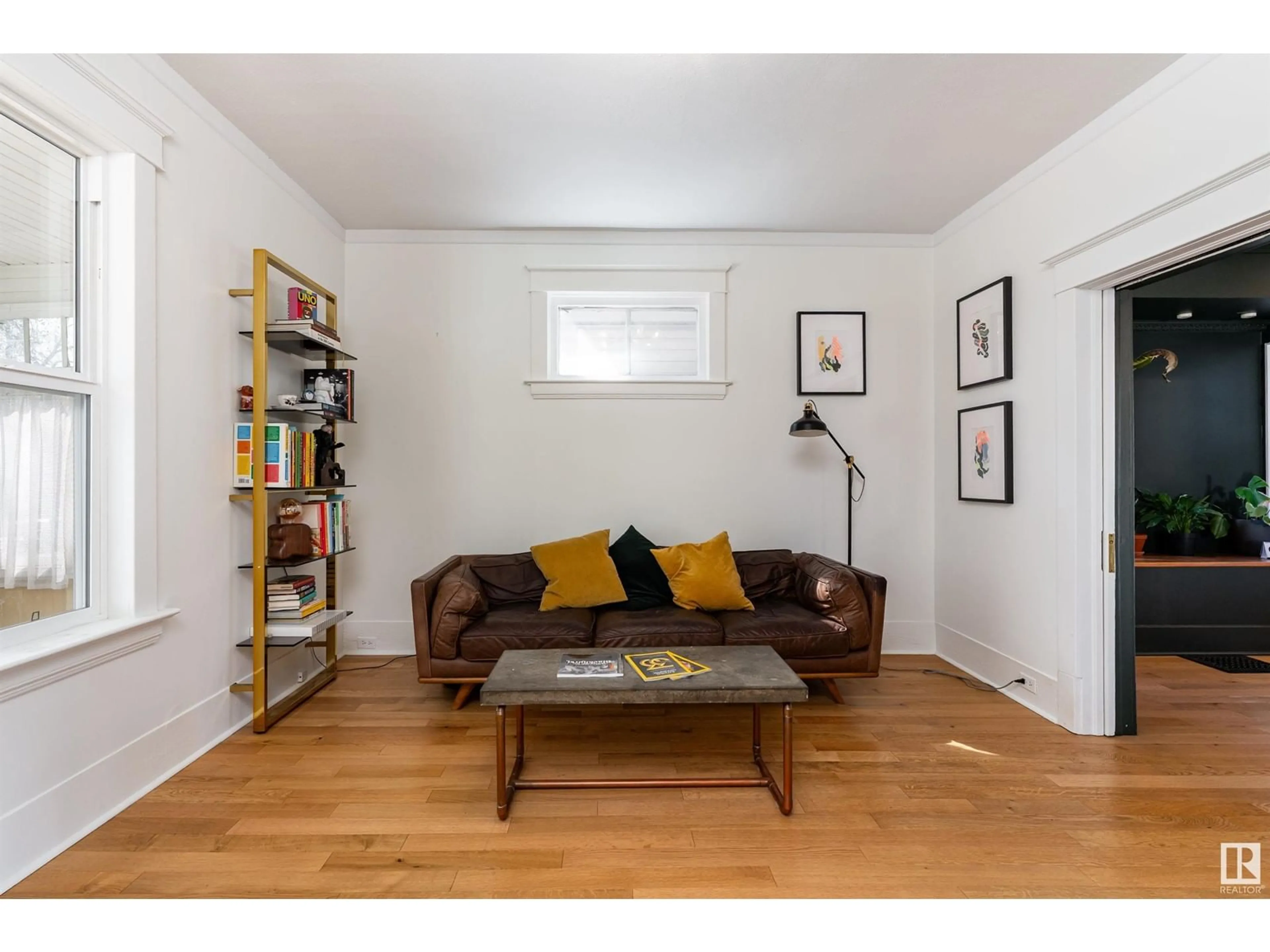 Living room with furniture, wood/laminate floor for NW - 11216 91 ST, Edmonton Alberta T5B4A2