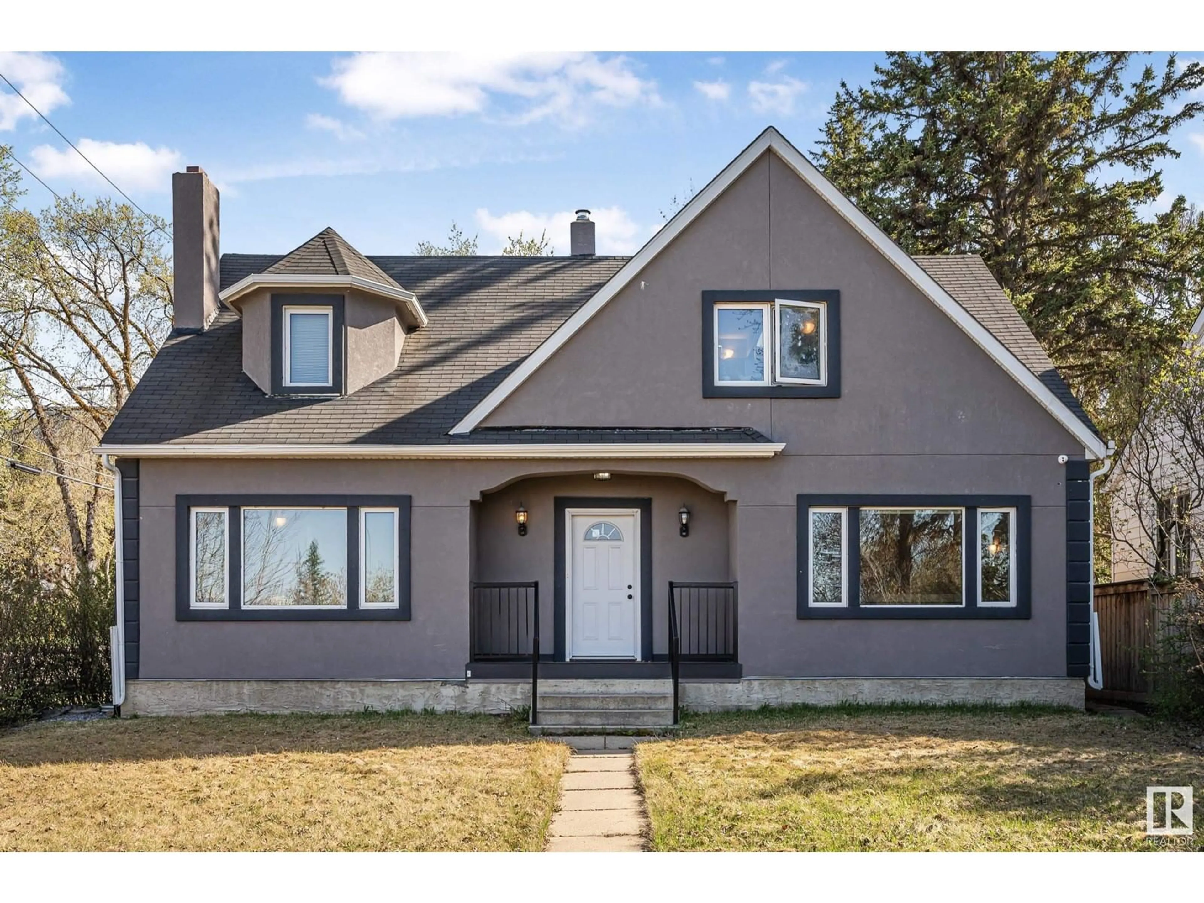 Home with vinyl exterior material, street for 11603 SASKATCHEWAN DR, Edmonton Alberta T6G2B5