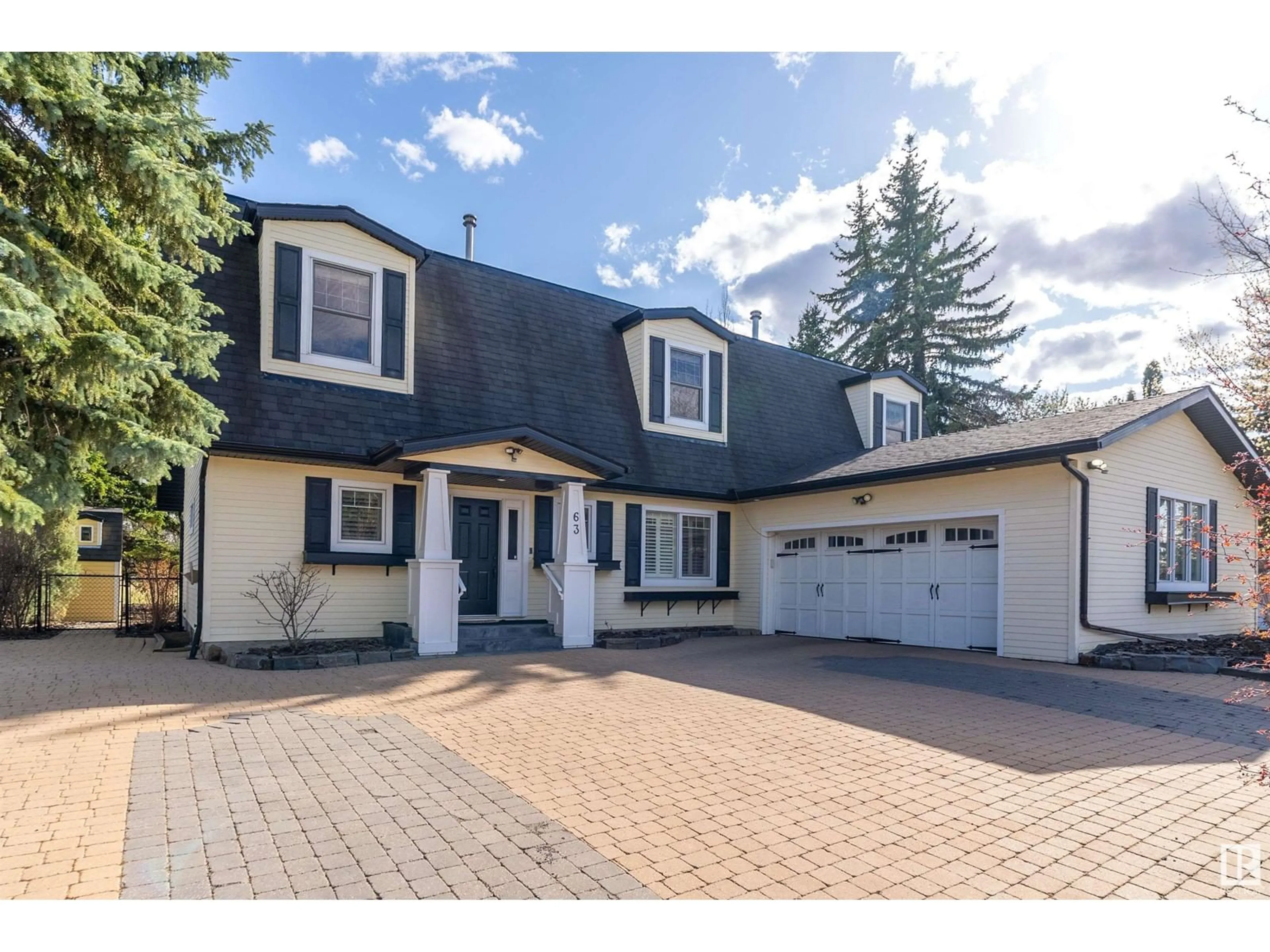 Home with vinyl exterior material, street for 63 FAIRWAY DR, Edmonton Alberta T6J2C2