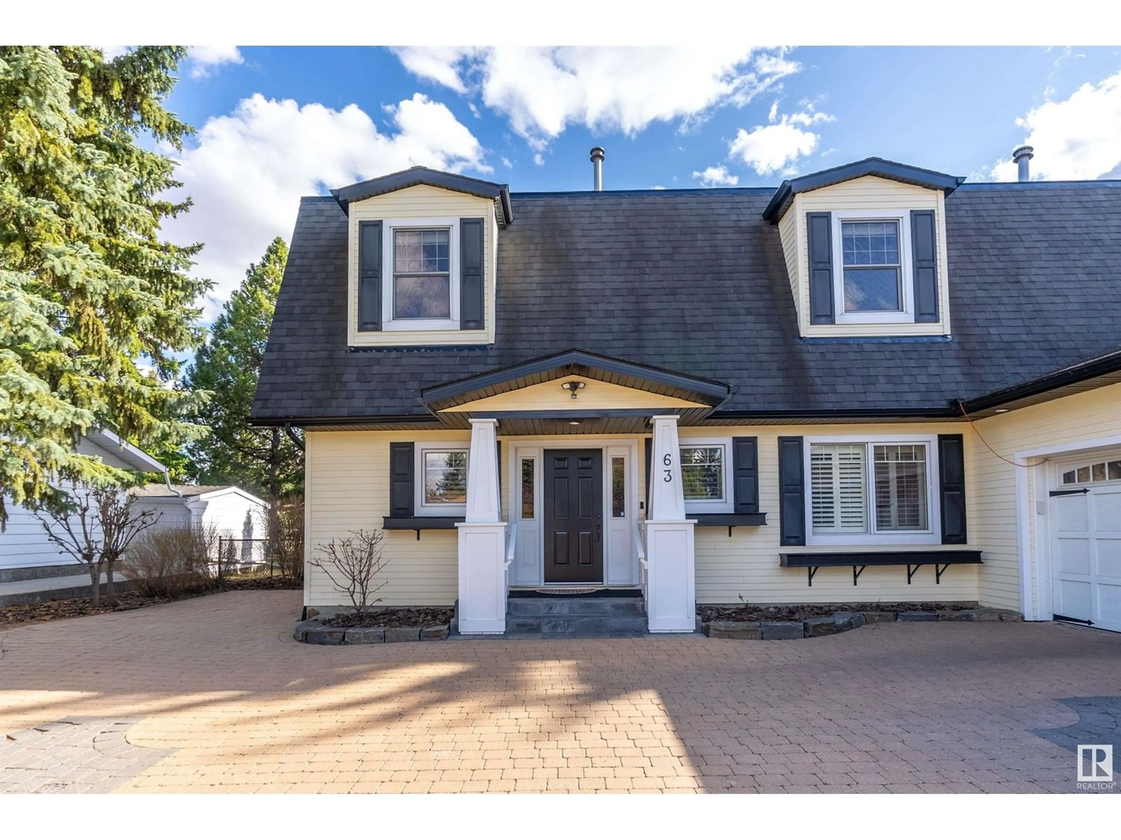 Home with vinyl exterior material, street for 63 FAIRWAY DR, Edmonton Alberta T6J2C2