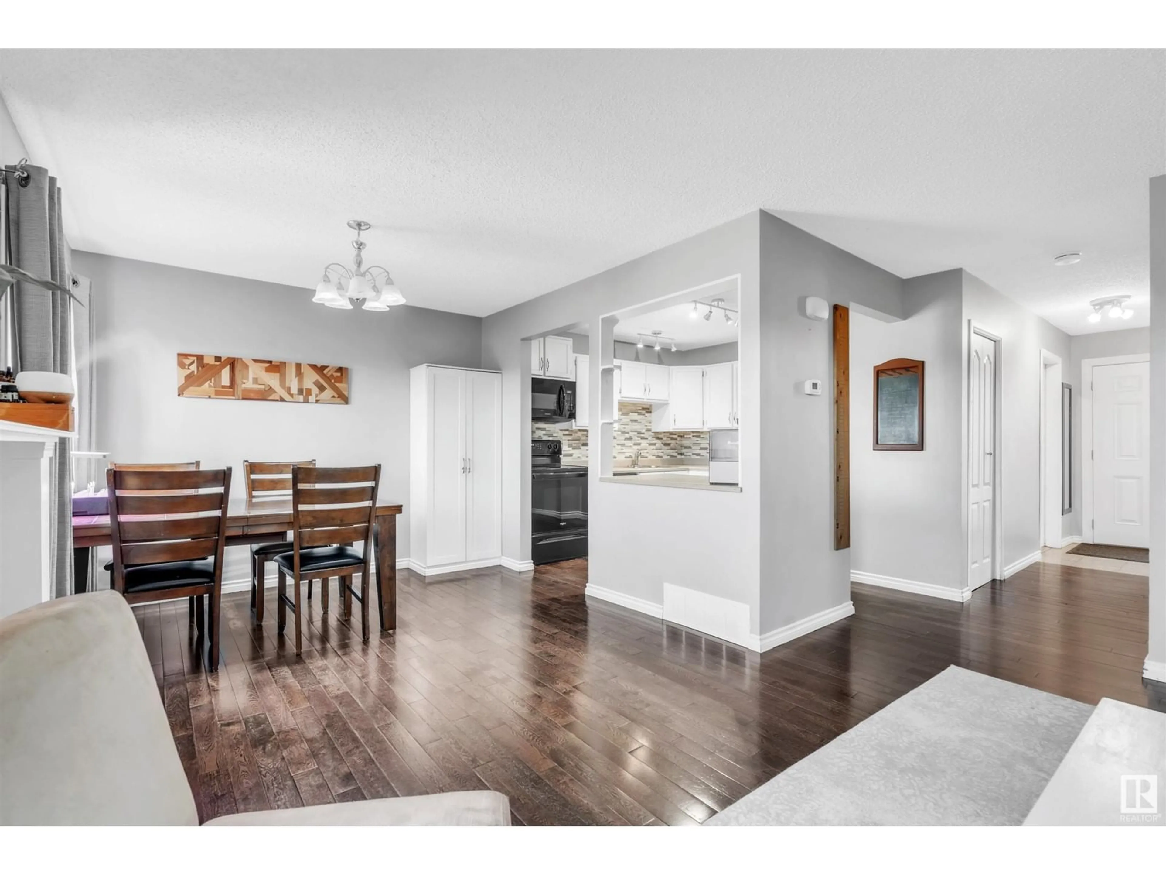 Open concept kitchen, wood/laminate floor for #9 - 5310 57A ST, Cold Lake Alberta T9M1S1