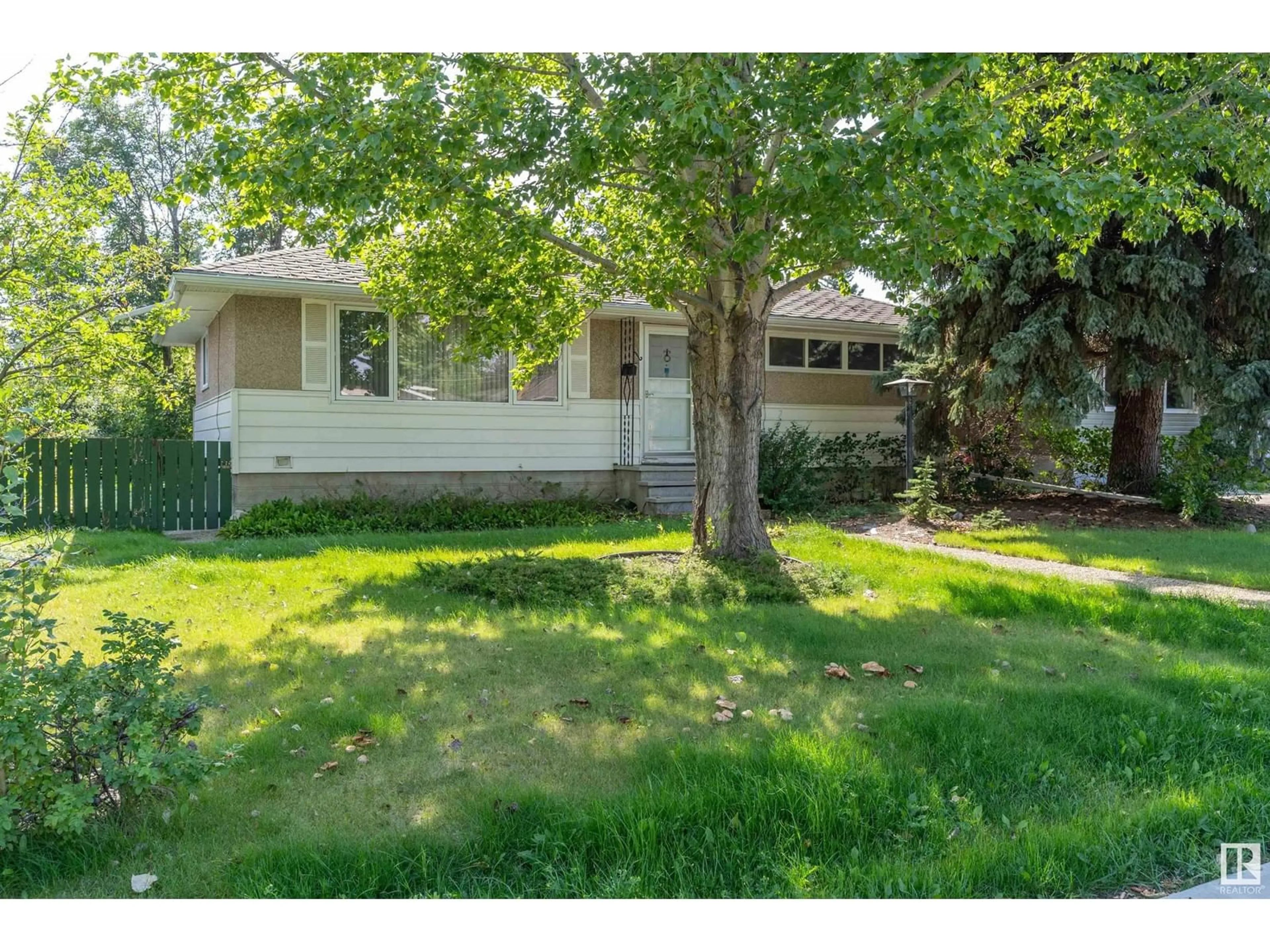 Home with vinyl exterior material, street for NW - 14519 86 AV, Edmonton Alberta T5R4B5