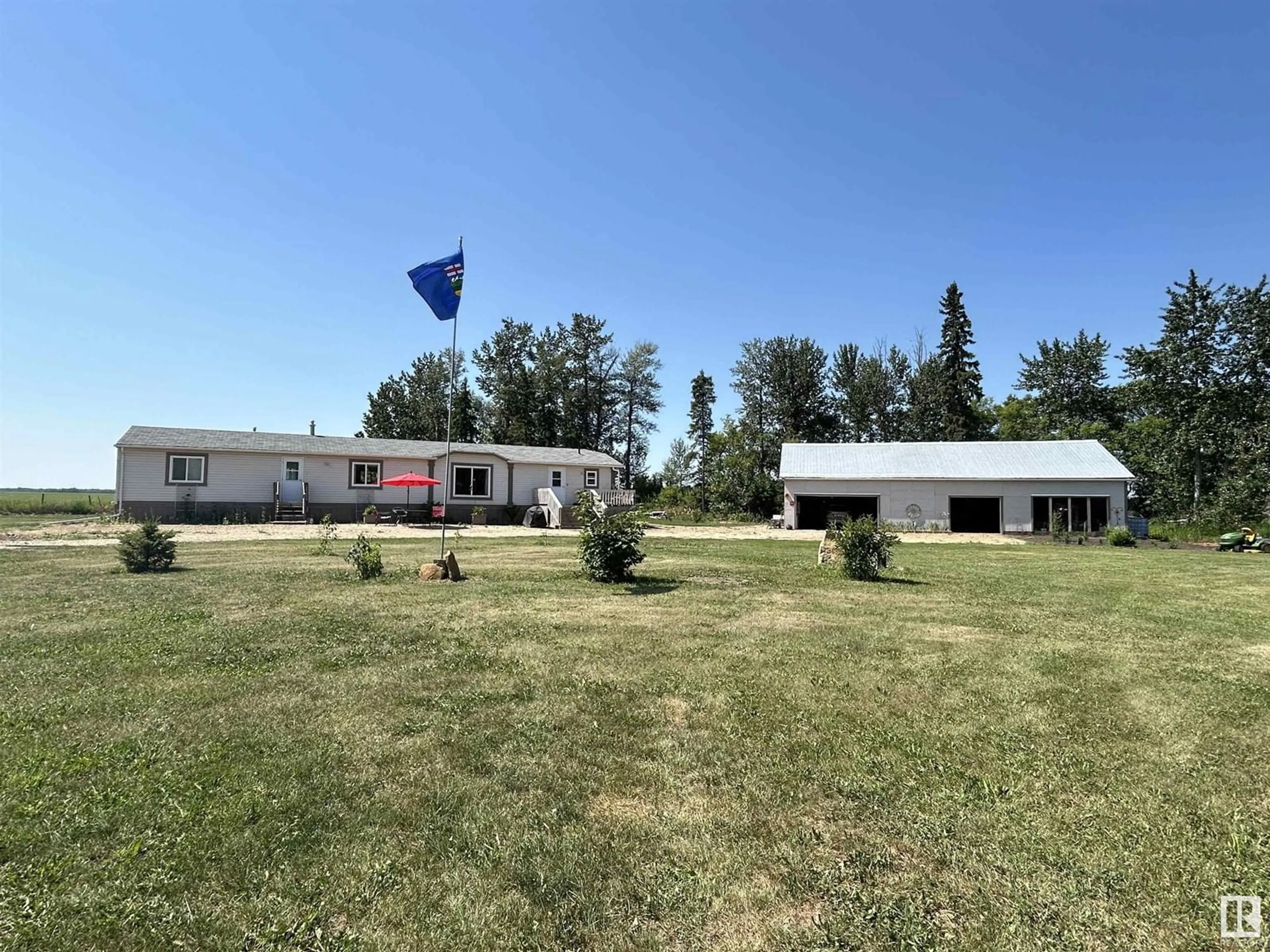 A pic from outside/outdoor area/front of a property/back of a property/a pic from drone, mountain view for 58524 RR 241, Rural Westlock County Alberta T0G2J0