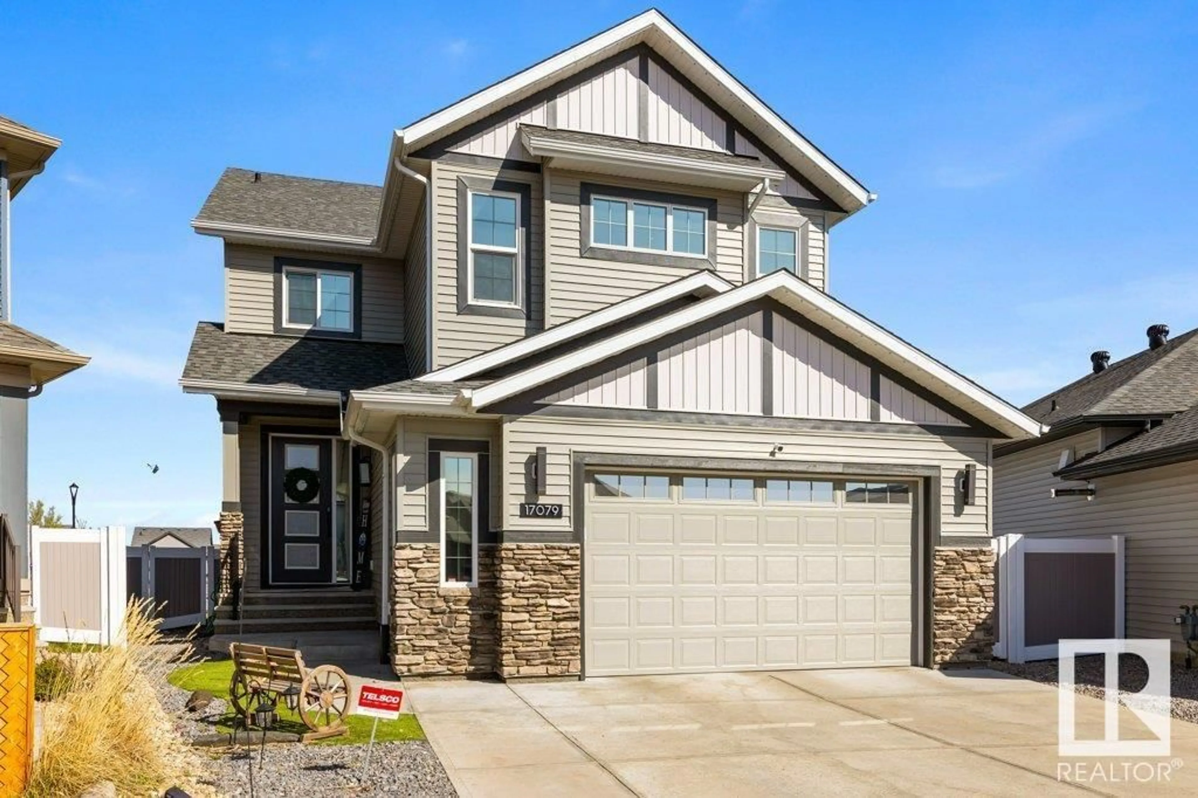 Home with vinyl exterior material, street for NW - 17079 46 ST, Edmonton Alberta T5Y4B1