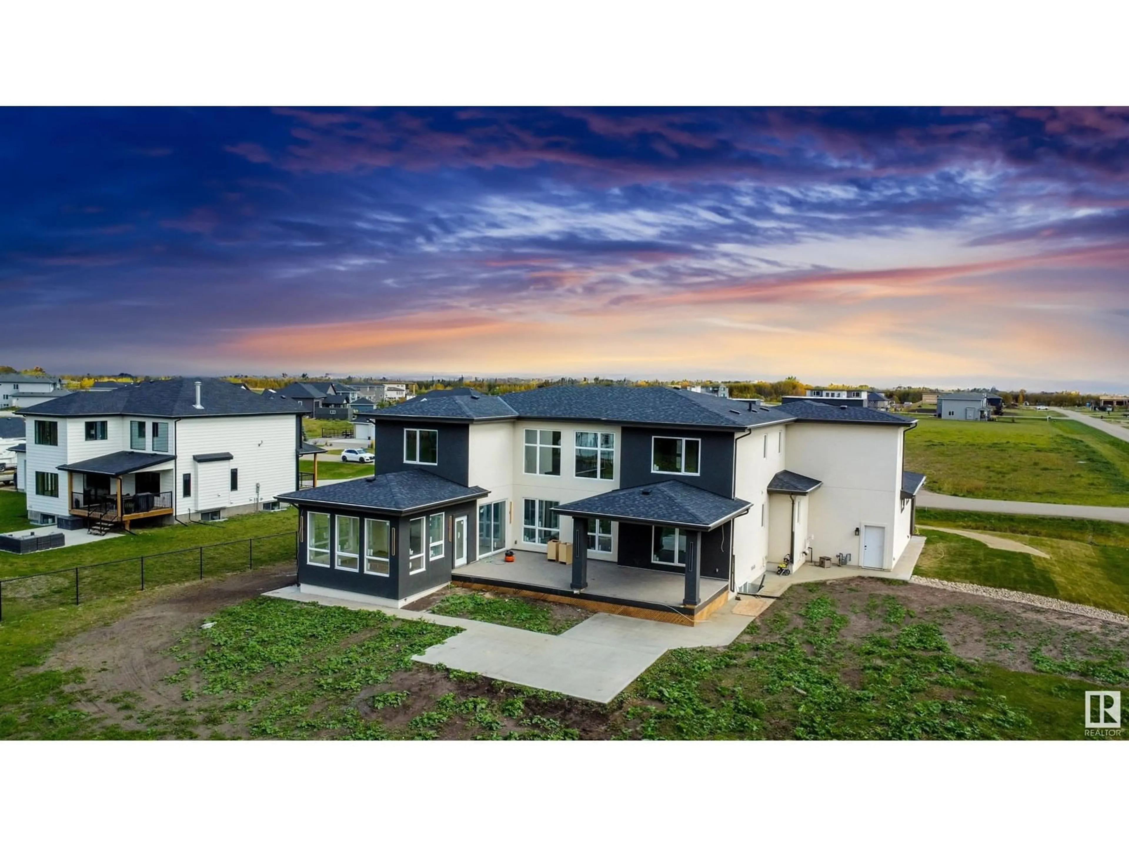 A pic from outside/outdoor area/front of a property/back of a property/a pic from drone, unknown for 48 26409 TWP RD 532 A, Rural Parkland County Alberta T7X0W7