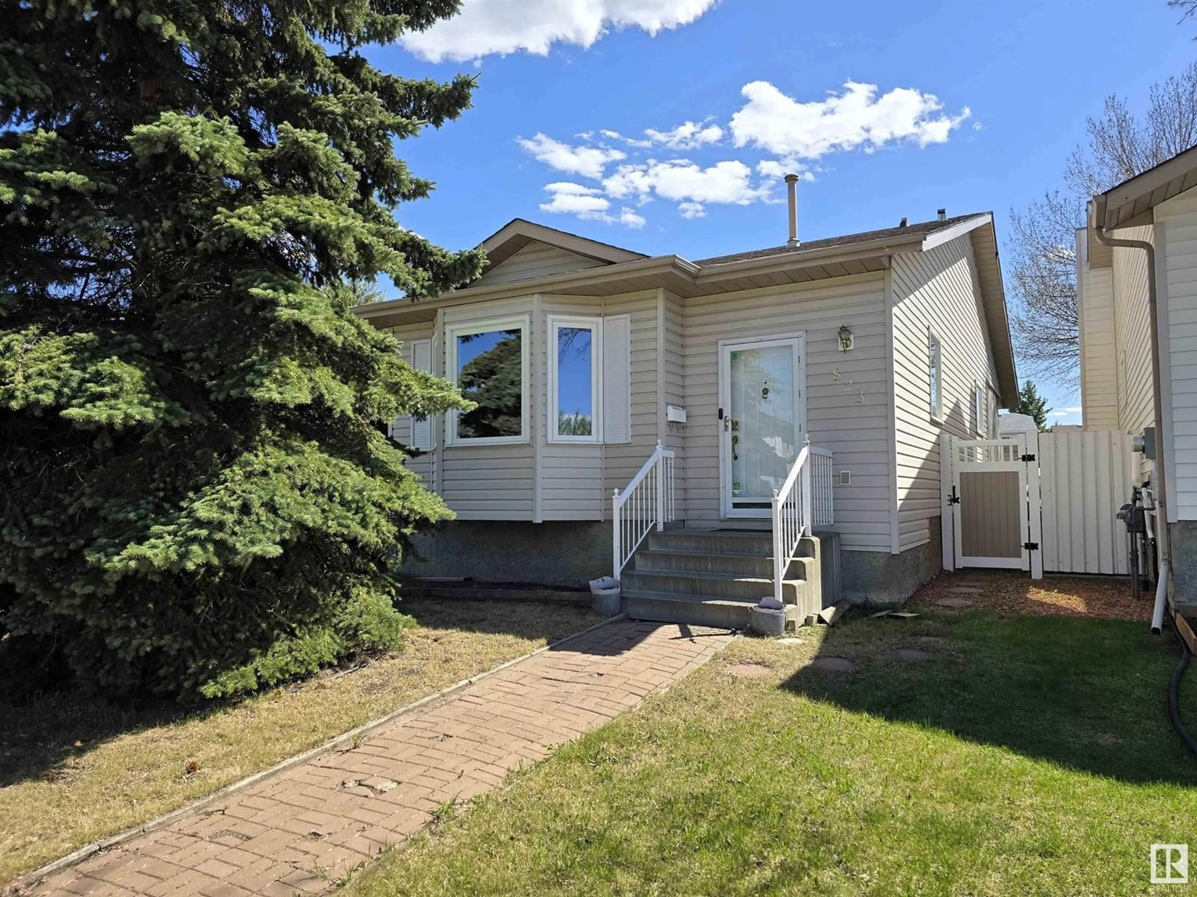 Home with vinyl exterior material, street for 823 JOHNS CL, Edmonton Alberta T6L6P2