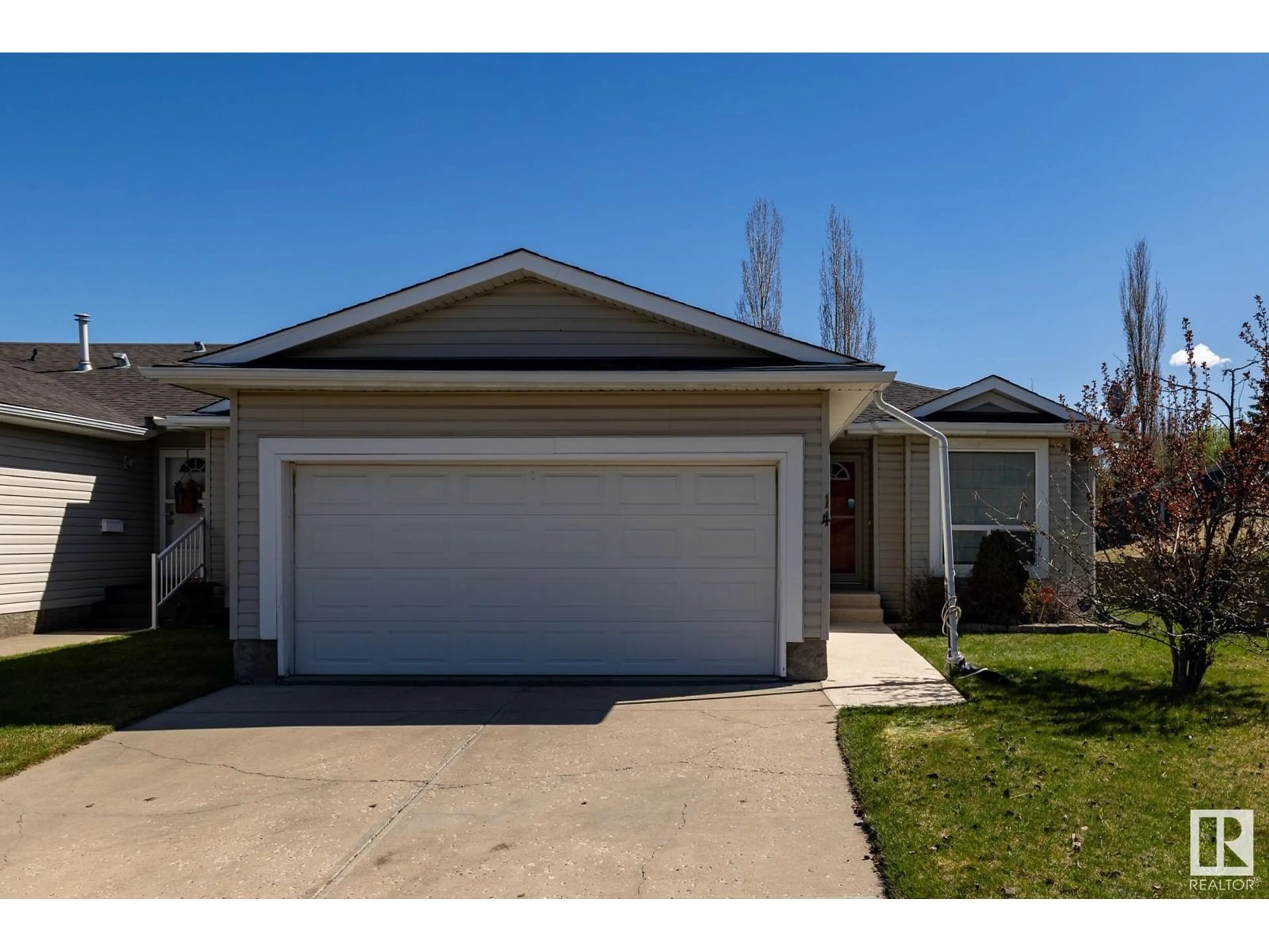 Home with vinyl exterior material, street for 14 HILLCREST CO, Spruce Grove Alberta T7X4A8